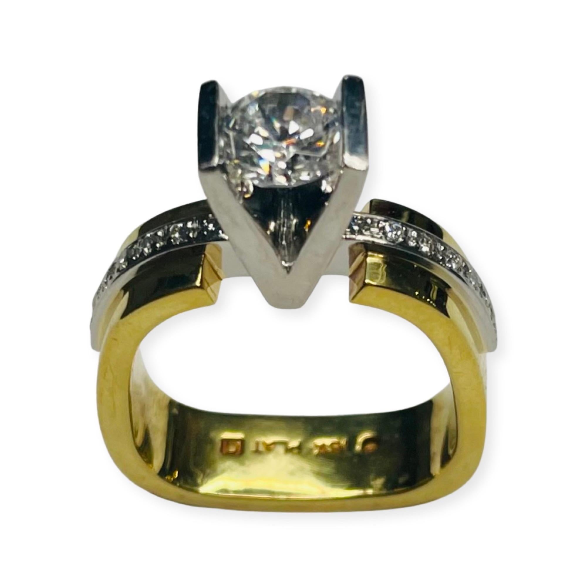Eddie Sakamoto 18K yellow gold, Platinum and Diamond Ring. The center is a channel set Cubic Zirconia. It is equivalent in size to a 6.5mm or 1.0 carat diamond. It can be replaced with a colored stone, moissonite, lab created or natural diamond for