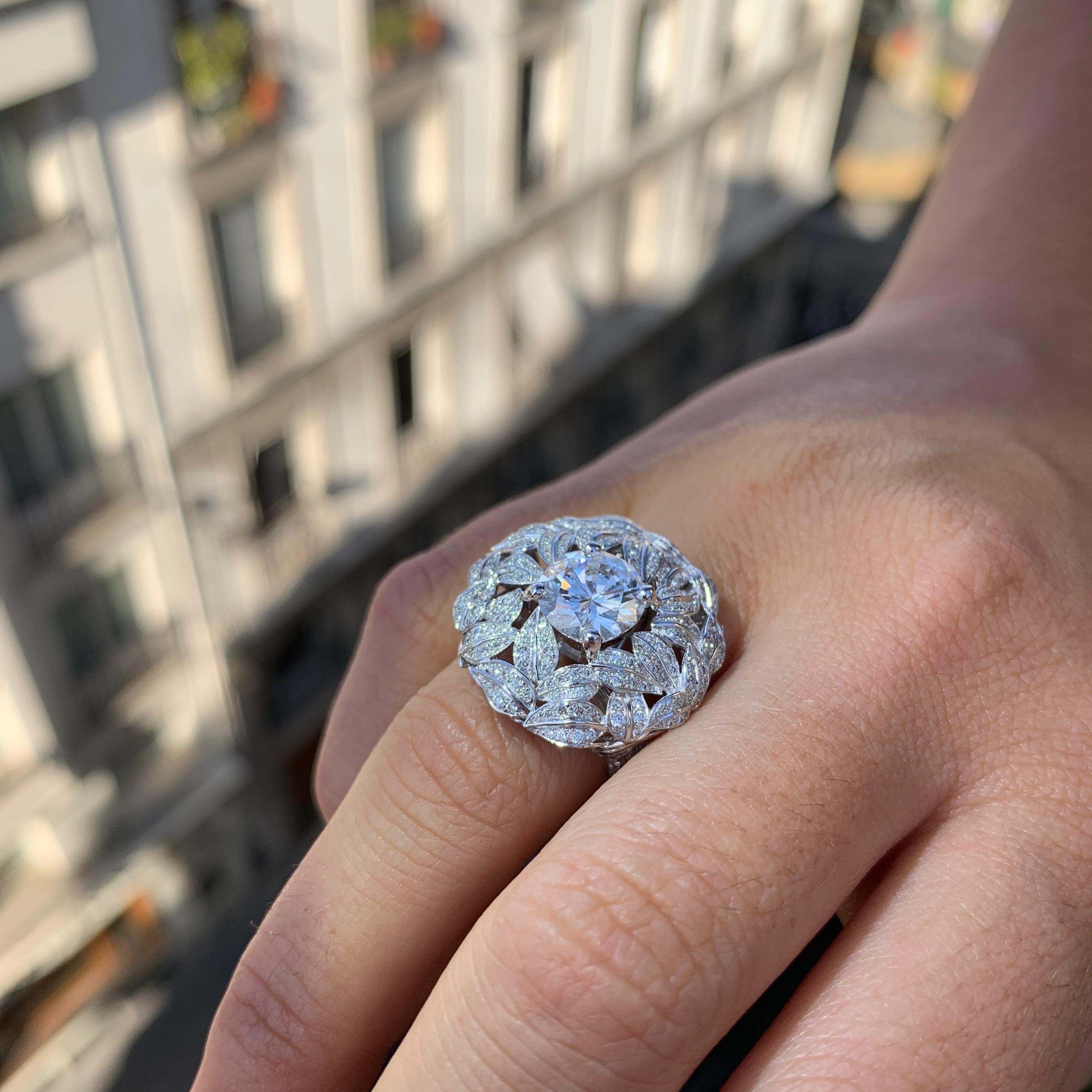Handcrafted in France in our High Jewelry Paris workshop. Titled “Full Moon”, and designed by Édéenne, artist and founder of Maison Édéenne, the ring features a stunning GIA certified 2.02 carat D-VVS1 white diamond center stone at the top of a dome