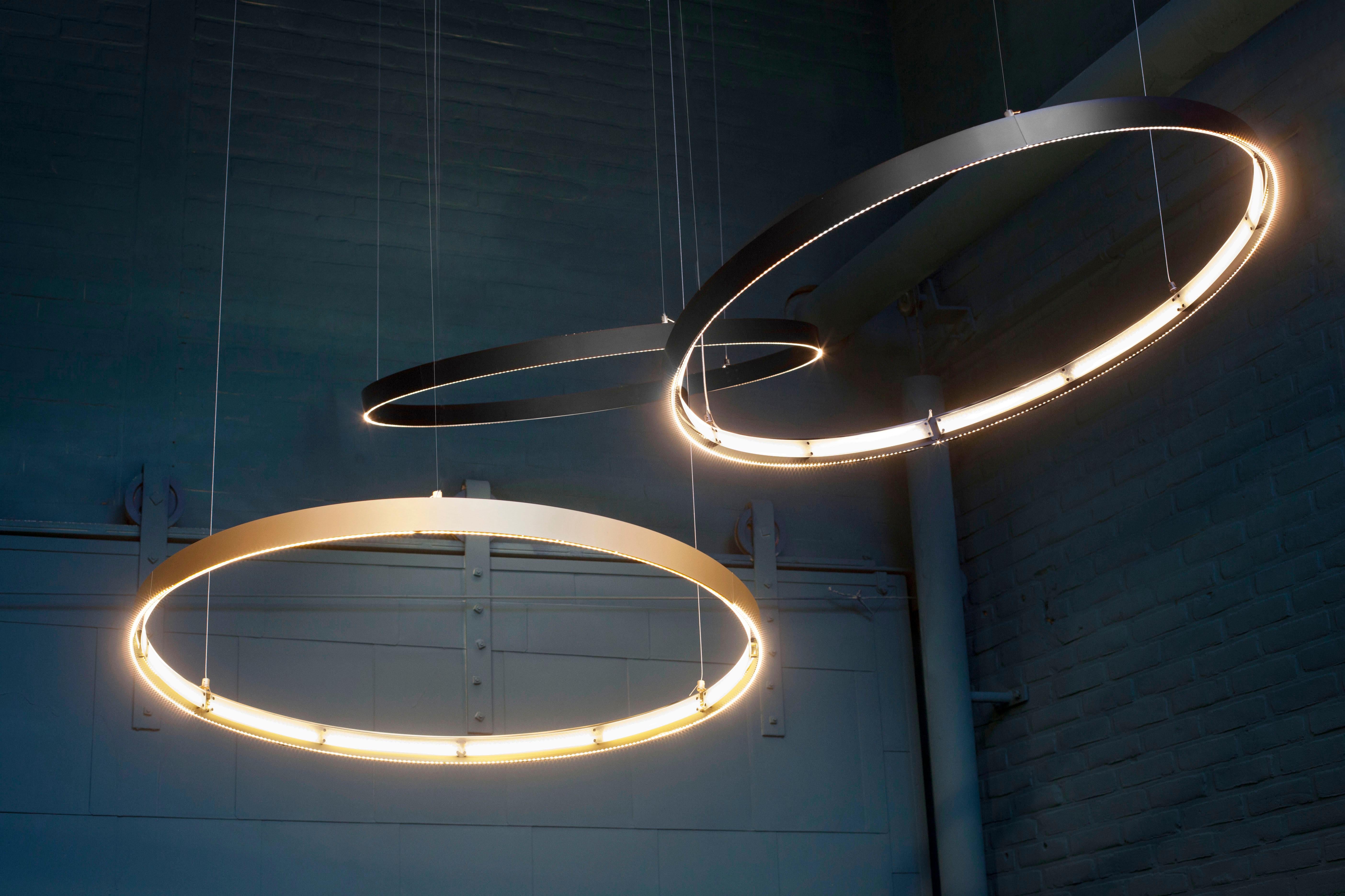 Eden Deco Ring 150 Champagne Aluminum Pendant Lamp by JSPR
Designed by Jasper van Grootel.
Dimensions: Ø 150 x H 5 cm.
Materials: Anodized aluminum.

Handmade in The Netherlands. Available in seven different luxurious anodized colors. All our lamps