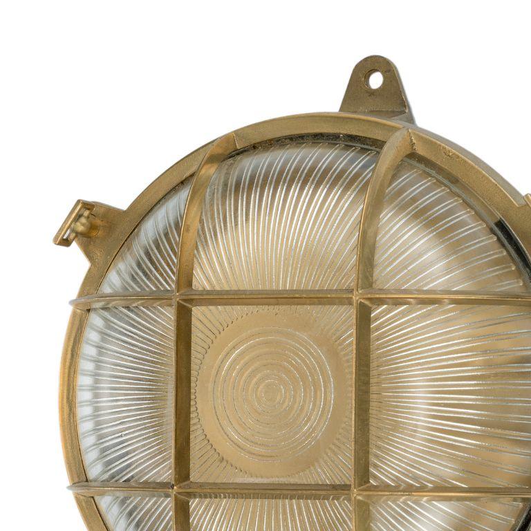 Introducing our mesmerizing Eden nautilus brass and glass spotlight, reminiscent of the classic lights adorning boats. Crafted with meticulous attention to detail, this spotlight exudes nautical charm and timeless elegance. The sleek circular