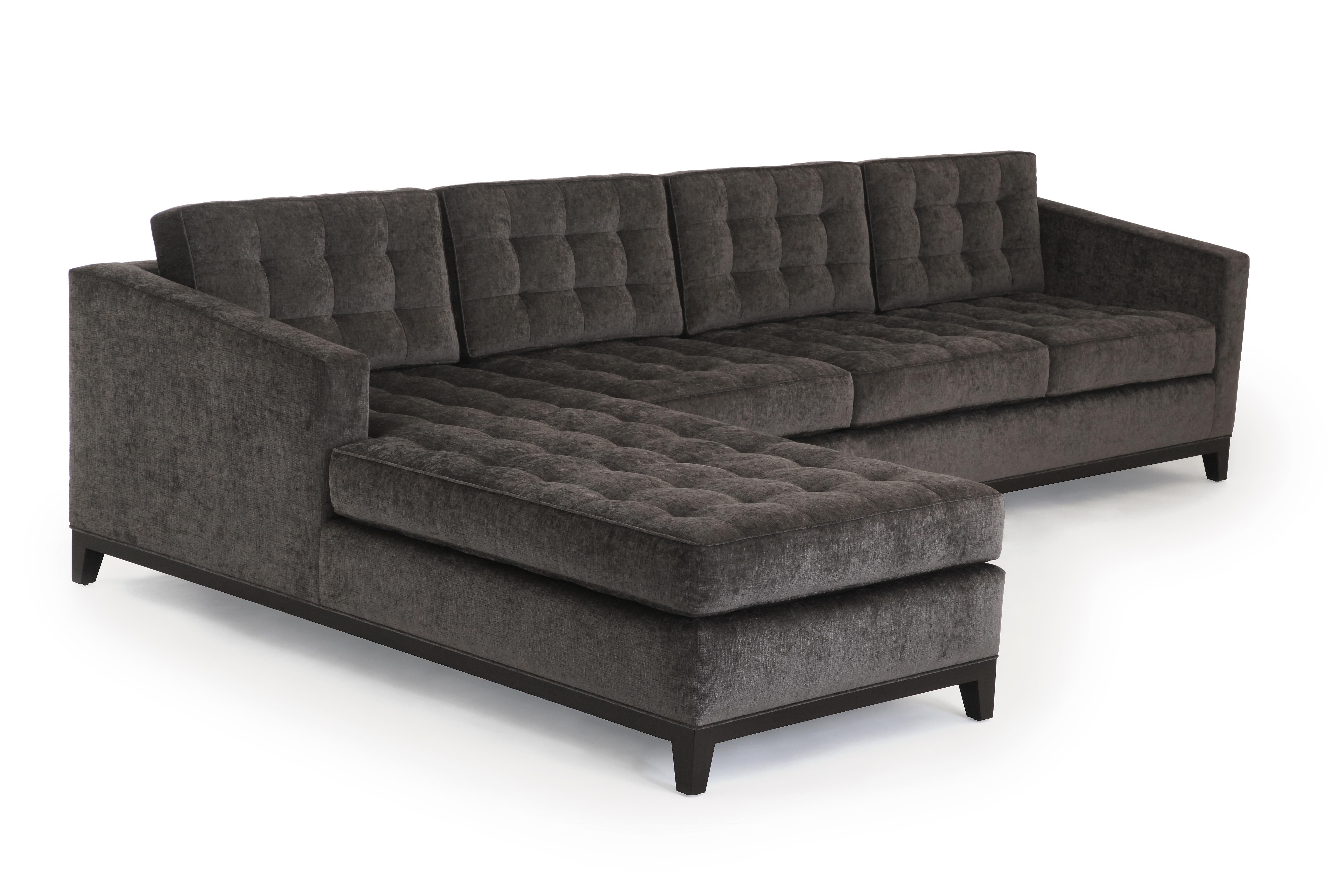 The Eden sectional features ultra-modern flair, high-level comfort, and clean modern lines with comfy loose cushions. Its sculptural profile is defined by its graphic grid-tufted pull detail and sloped arm, making the Eden sectional a stand out.