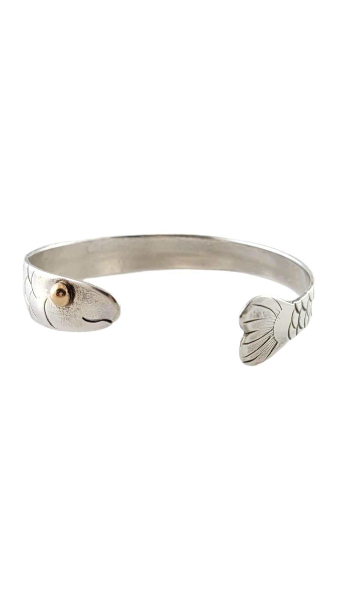 Eden Sterling Silver Cape Cod Fish Cuff Bracelet

This beautiful cape cod fish cuff bracelet by Eden was meticulously crafted from 925 sterling silver!

Size across: 63.9mm (2.52