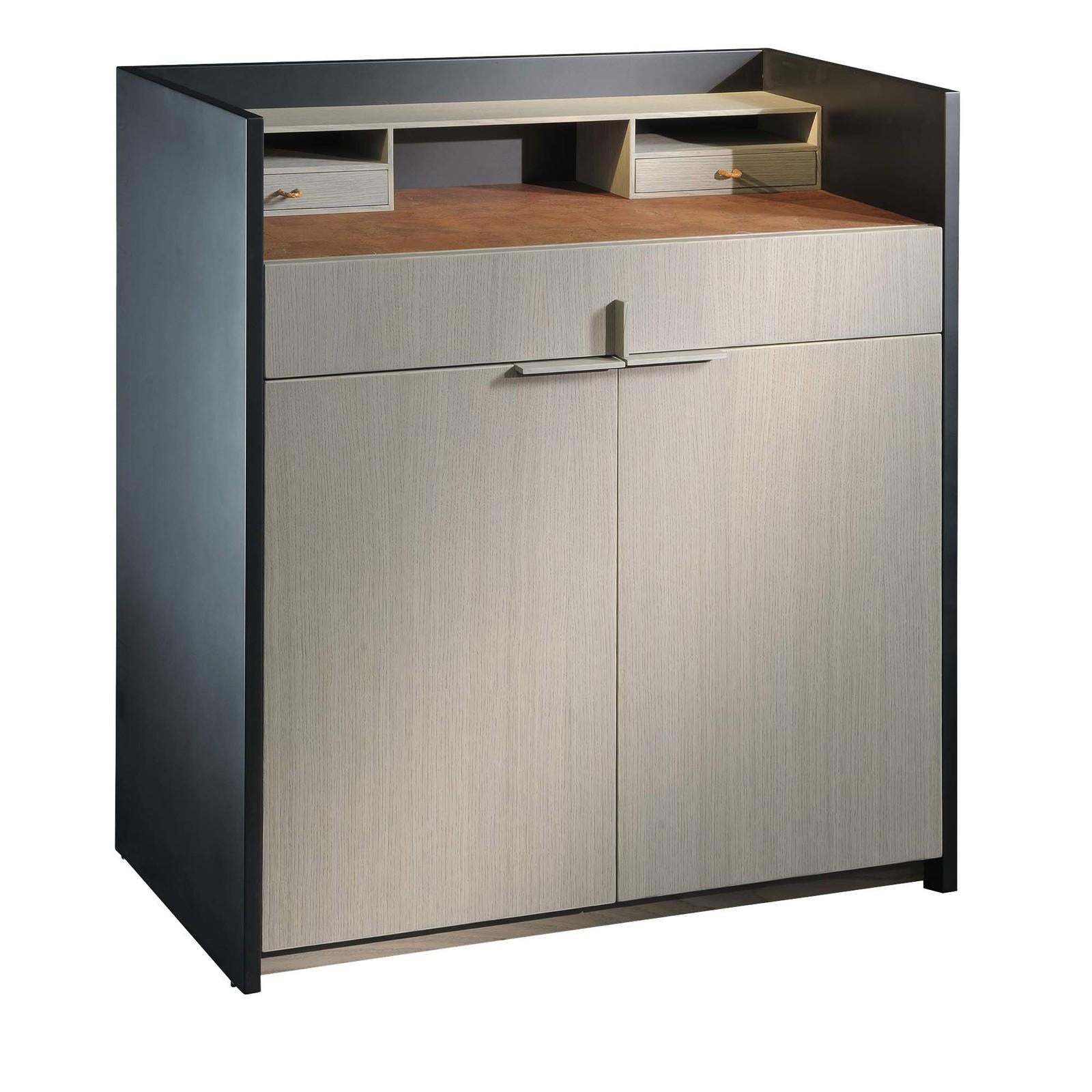 The elegant aesthetic of this cabinet is linear and pure, made of stained oak, black for the external frame and beige for the central unit, featuring two doors and a top drawer. Formal simplicity and sophisticated finishes give this piece a strong