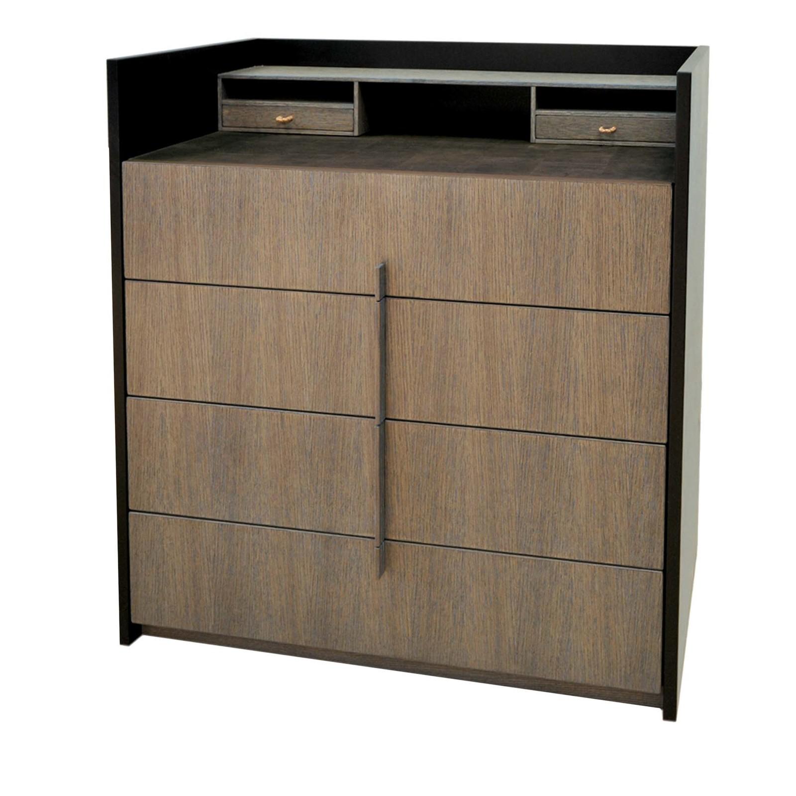Simple in design yet rich in details, this chest of drawers elevates the essence of minimalism. Encased in a black stained oak frame, the cerused moss/indigo drawers are free of traditional handles but feature a vertical bar of stained oak (also