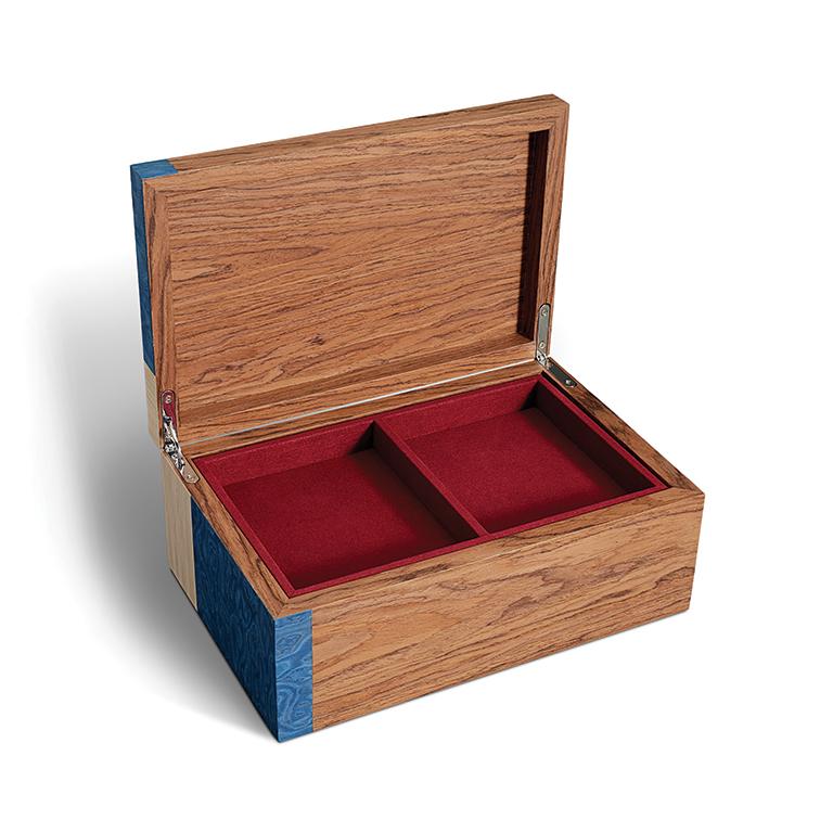 The Edgar Box is a modernist take on the classic hand symbol. Handcrafted with authentic exotic wood vaneers using marquetry techniques. the Edgar collection is suitable to adorn any room. Assembled in China.