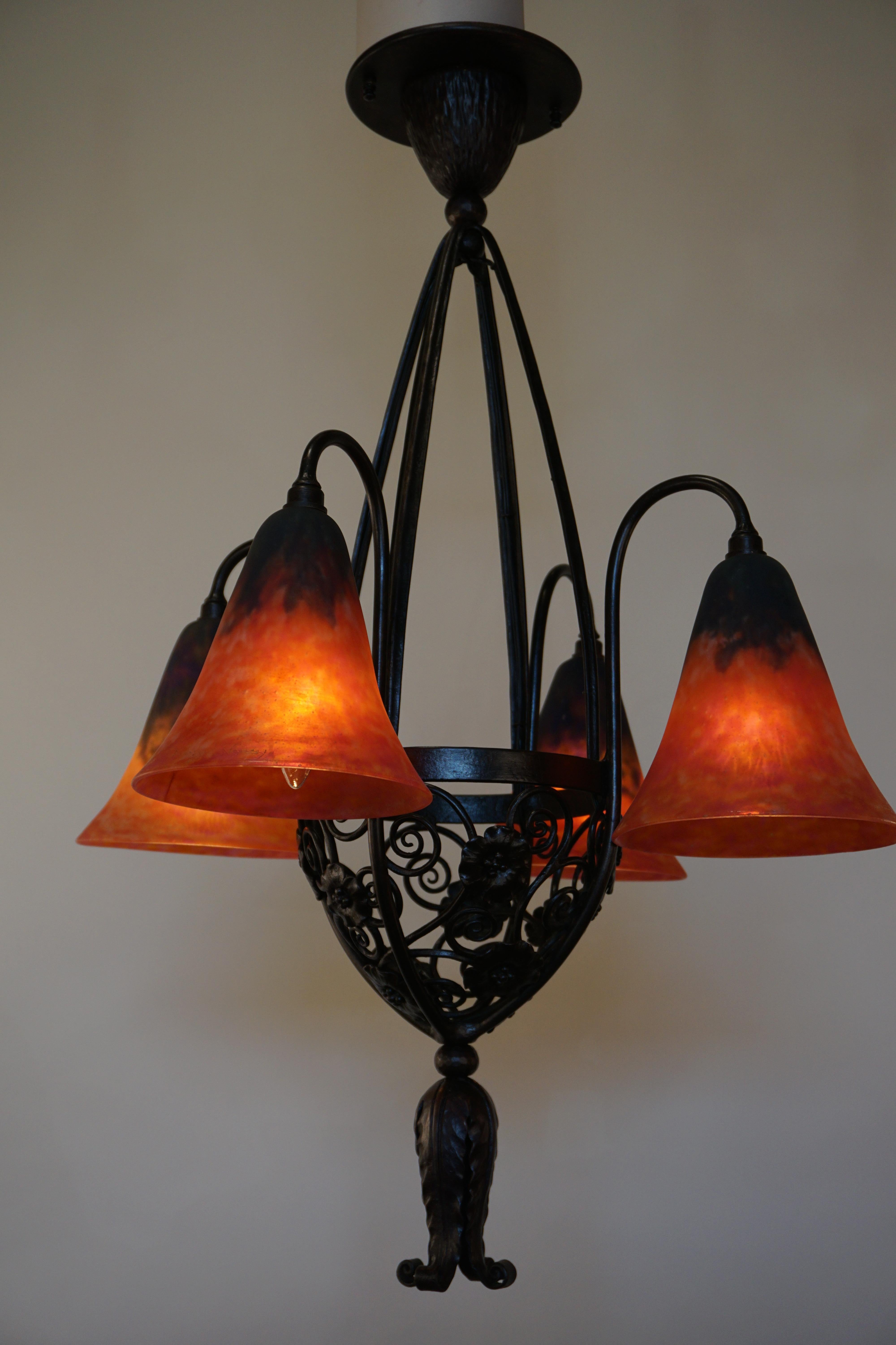 French 1920s wrought iron chandelier by Edger Brandt, handblown glass shades by Daum Nancy.