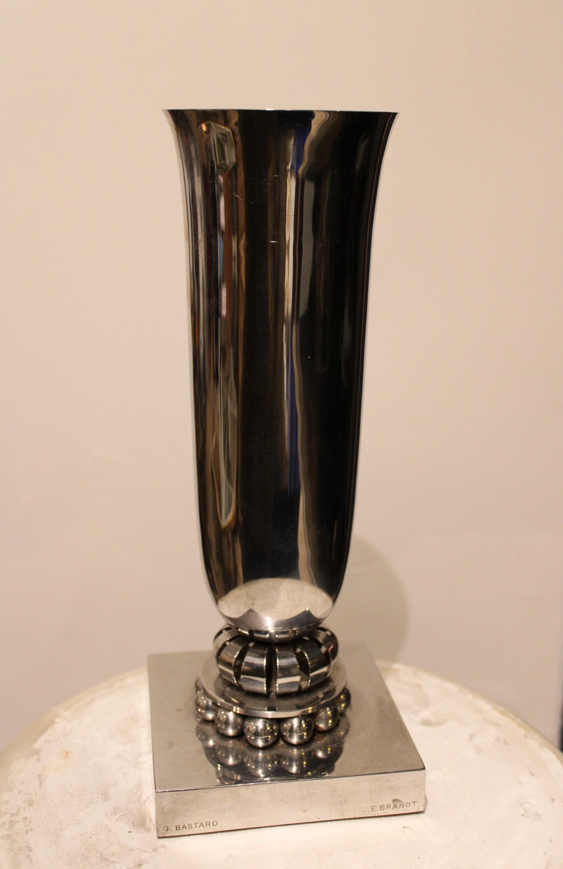Vase by Edgar Brandt (1880-1960) and George Bastard (1881-1939)
Chromed-metal
Stamped E. Brandt and G. Bastard
Circa 1935
Executed for the liner Normandie.
 