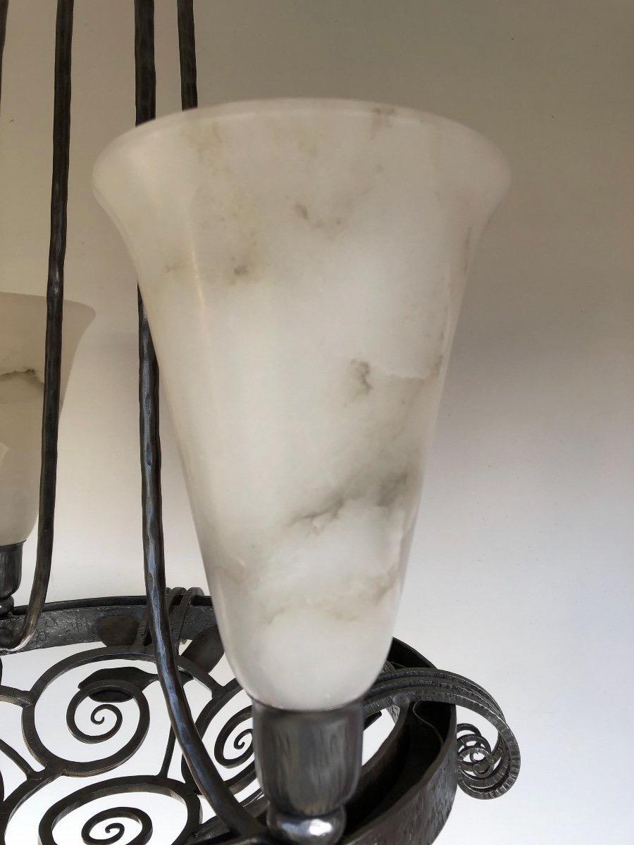 Edgar Brandt Art Deco chandelier
Chandeliers circa 1930 stamped twice Edgar Brandt in wrought iron Nickles.
4 shades in alabaster and 4 bubles led.
The chandelier is electrify as new. It is in perfect condition ready to hang.
Measures: Diameter: 47