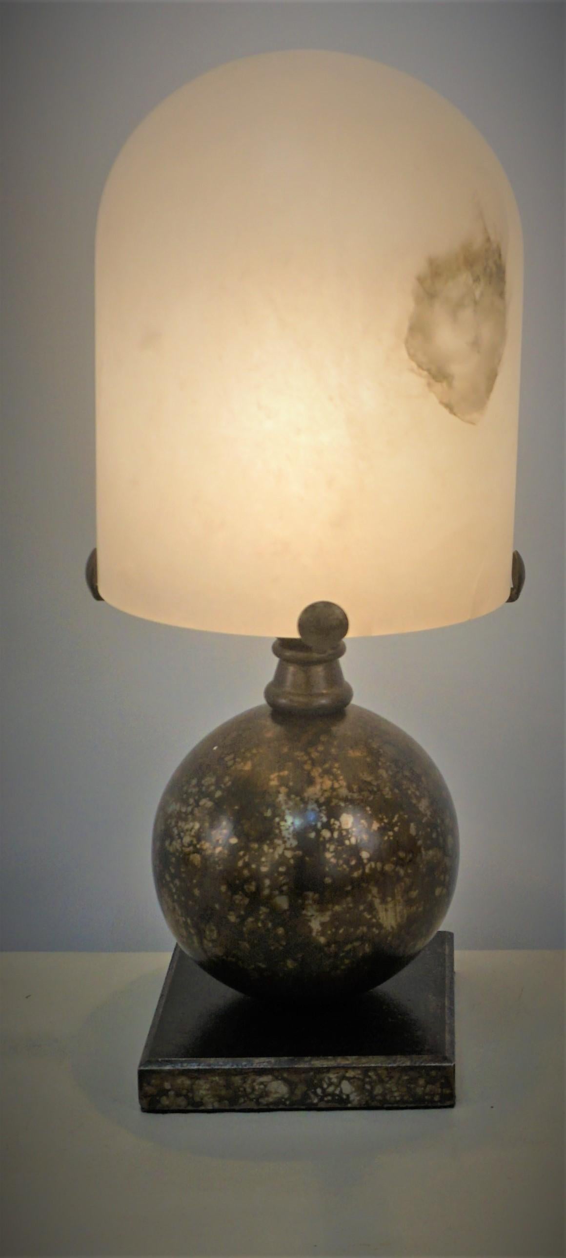 French 1920's rare Art Deco patinated textured iron table lamp with beautiful alabaster shade.
Rewired with fabric cord.