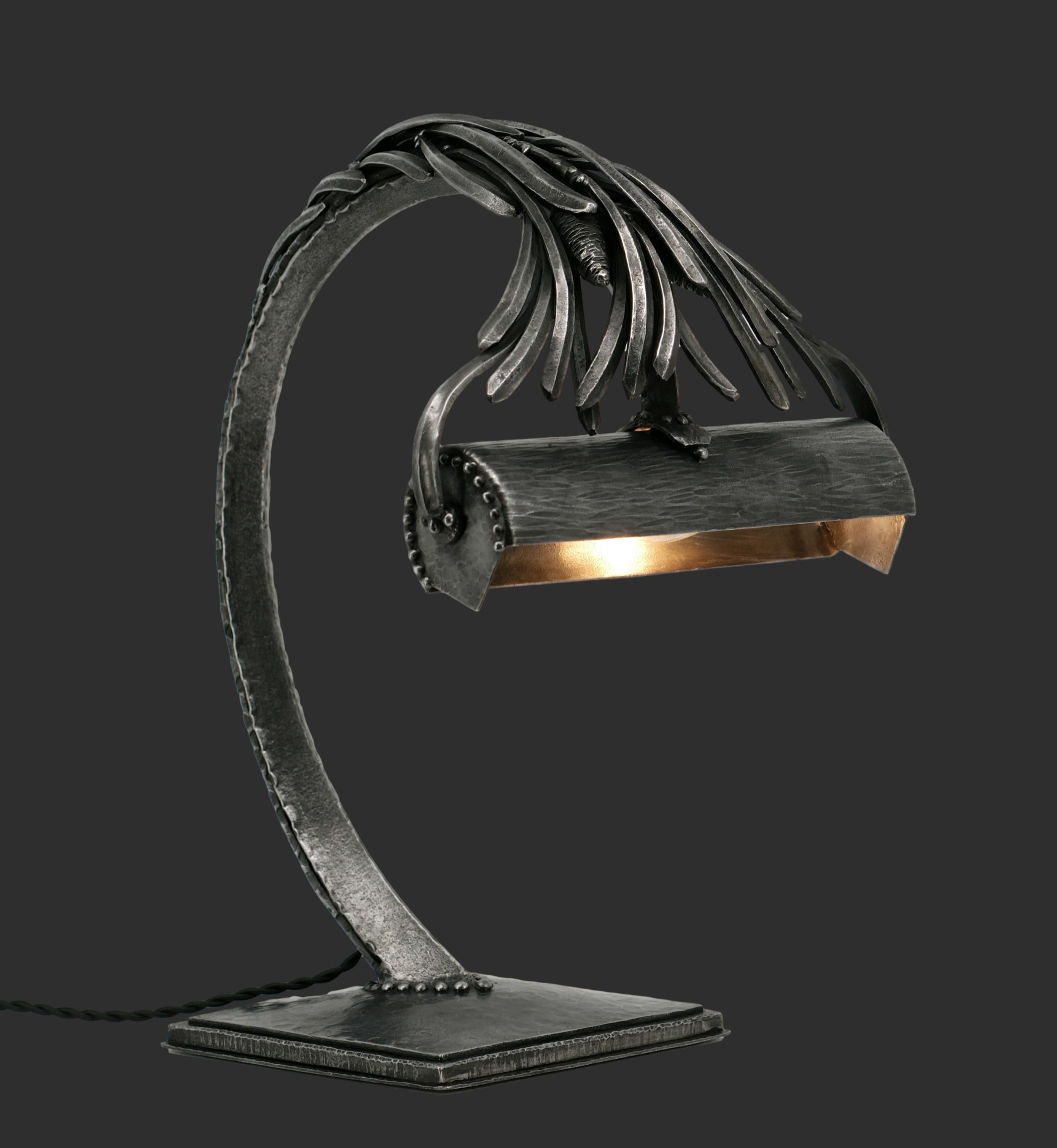 French Art Deco wrought iron desk lamp by Edgar Brandt, France, circa 1910. 'Les Pins'. The support decorated with pine cone and needles, shade adjustable. This lamp is rare. A smaller version was put up for sale by Christie's in April 2006. Nothing