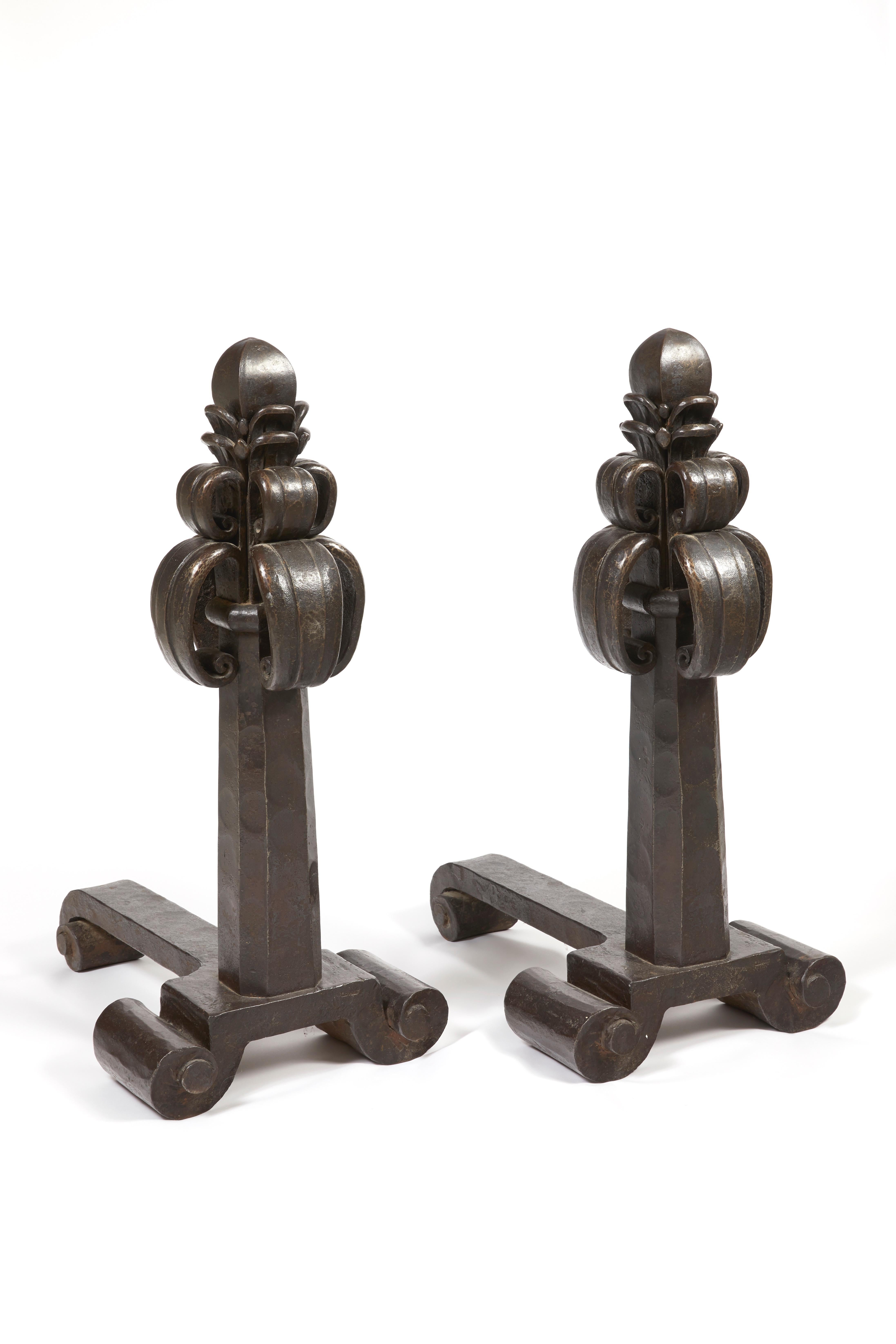 Pair of massive andirons, circa 1920
A pair of hammered wrought iron andirons, decorated with pinnacles and scrolls. Signed.
Measures: H 80 cm (H 31.5 in).