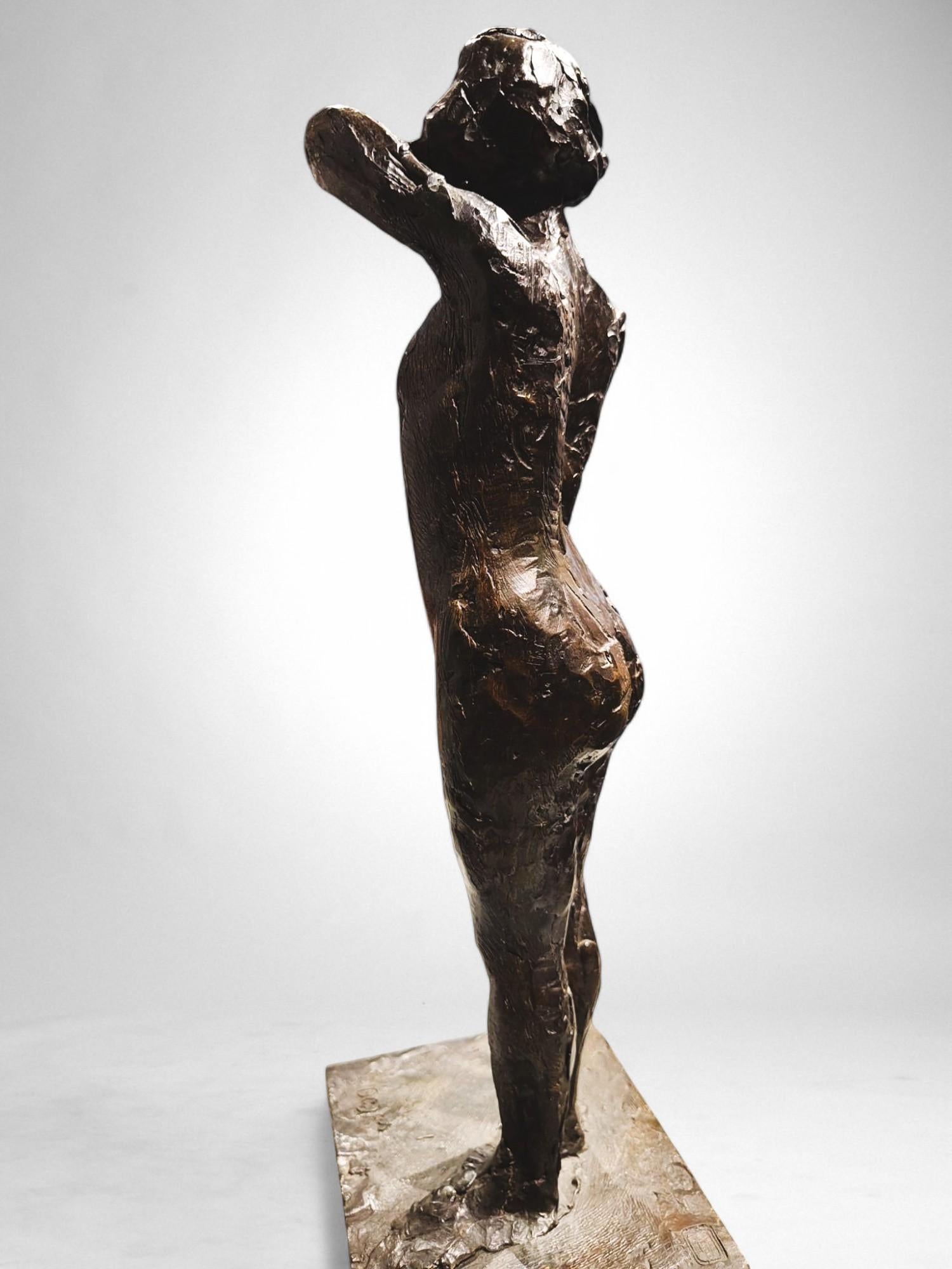 Dancer fastening the shoulder strap of her bodice – Edgar Degas, bronze cast by For Sale 10