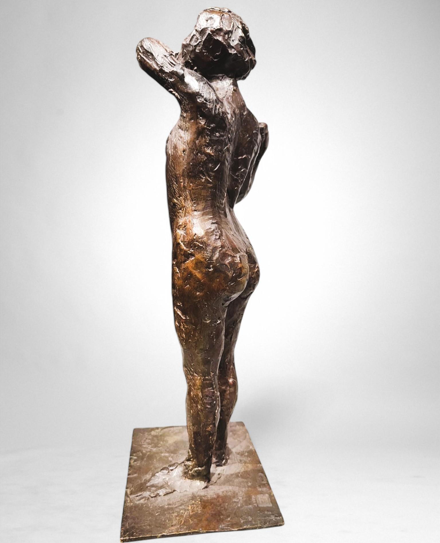 Dancer fastening the shoulder strap of her bodice – Edgar Degas, bronze cast by For Sale 5