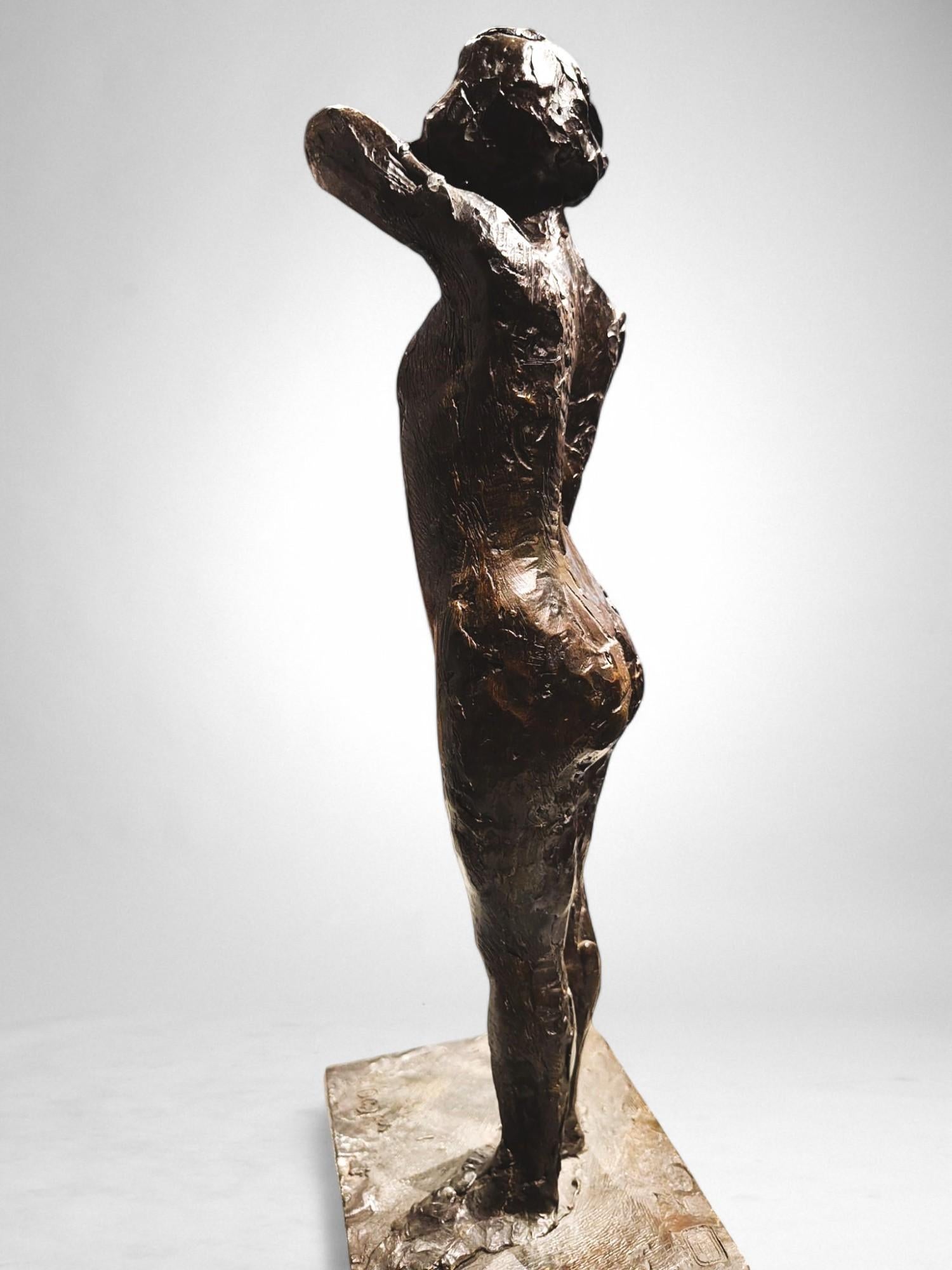 Dancer fastening the shoulder strap of her bodice – Edgar Degas, bronze cast by For Sale 7