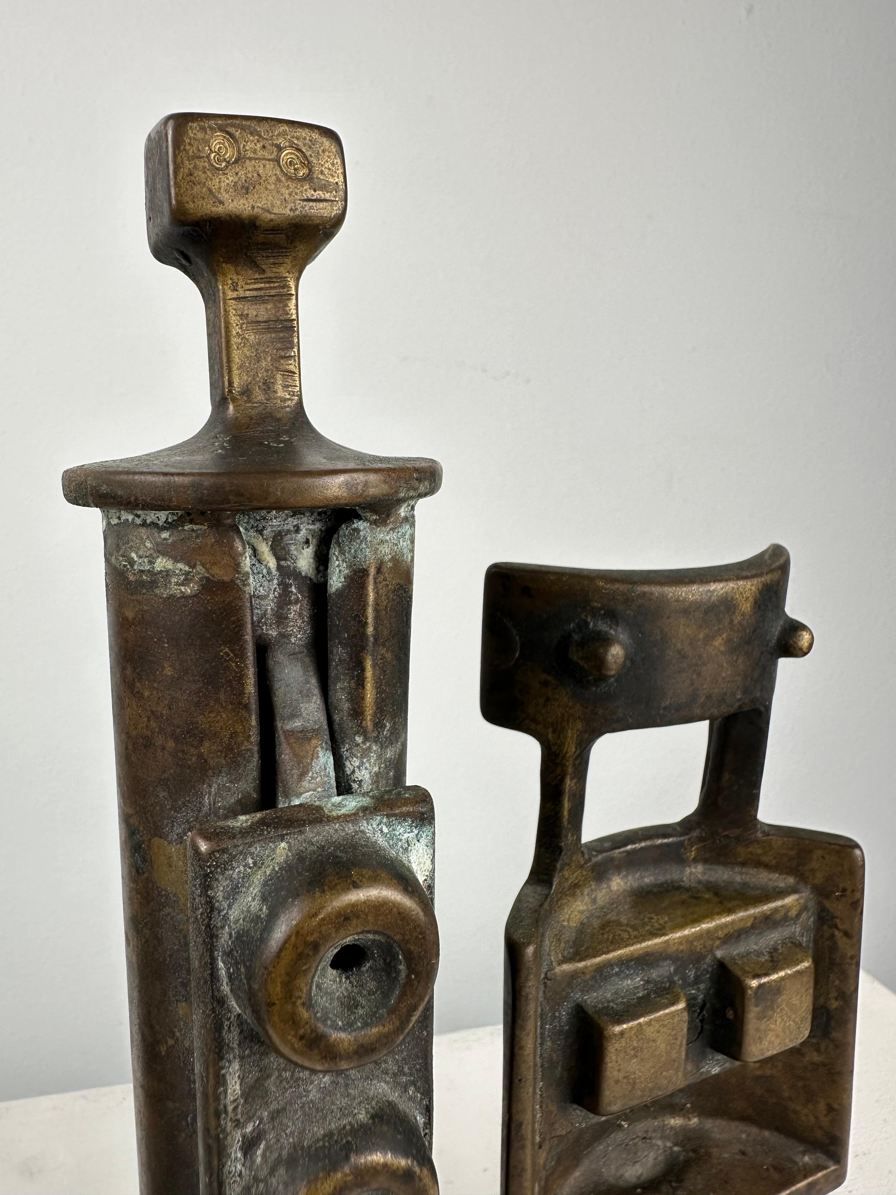 Four Figures - Gold Abstract Sculpture by Edgar Tafur