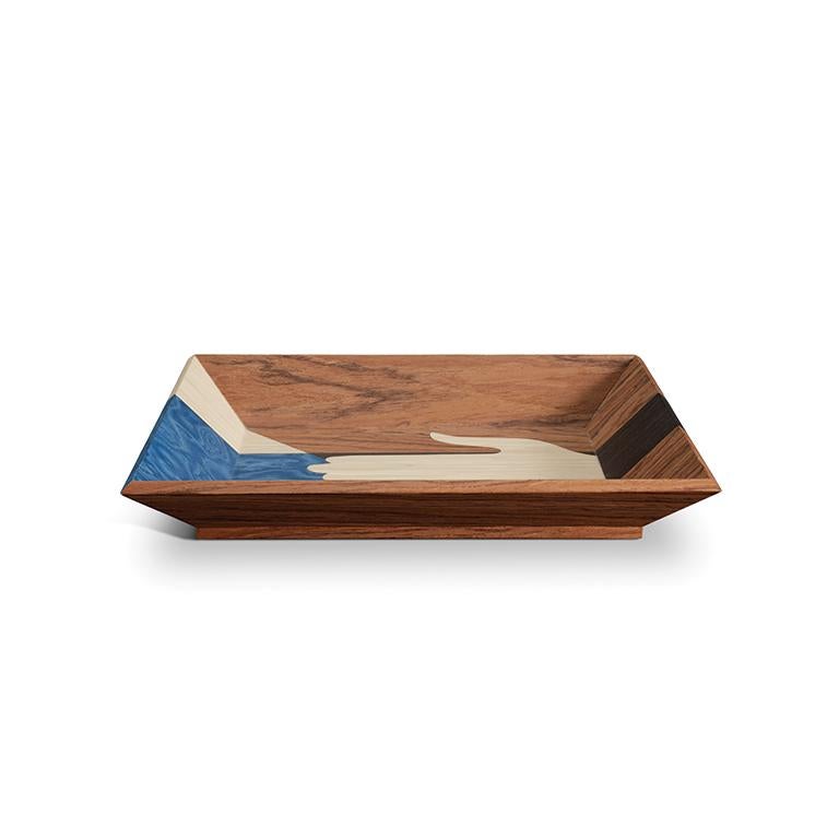 The Edgar Vide Poche is a modernist take on the classic hand symbol. Handcrafted with authentic exotic wood vaneers using marquetry techniques. the Edgar collection is suitable to adorn any room. Assembled in China.
