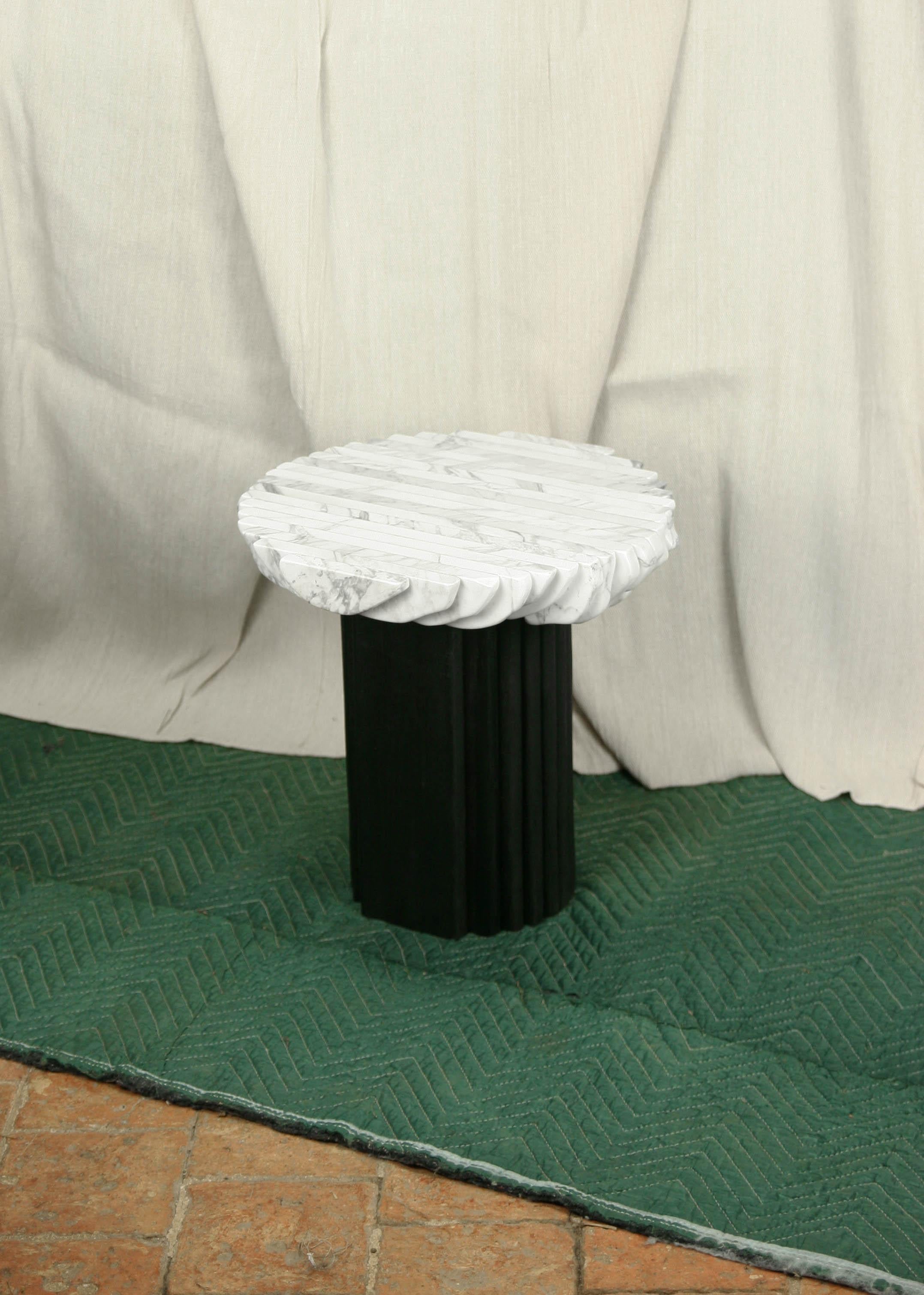 Edge side table by Krzywda.
Dimensions: 35 L x 35 D x 55 H cm.
Materials: marble, oak.
Available in other materials.

Individually handmade in France by Krzywda. All materials employed are from France. The individually selected marble blocks