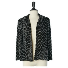edge to edge evening jacket with white glass beads and black sequins Circa 1970