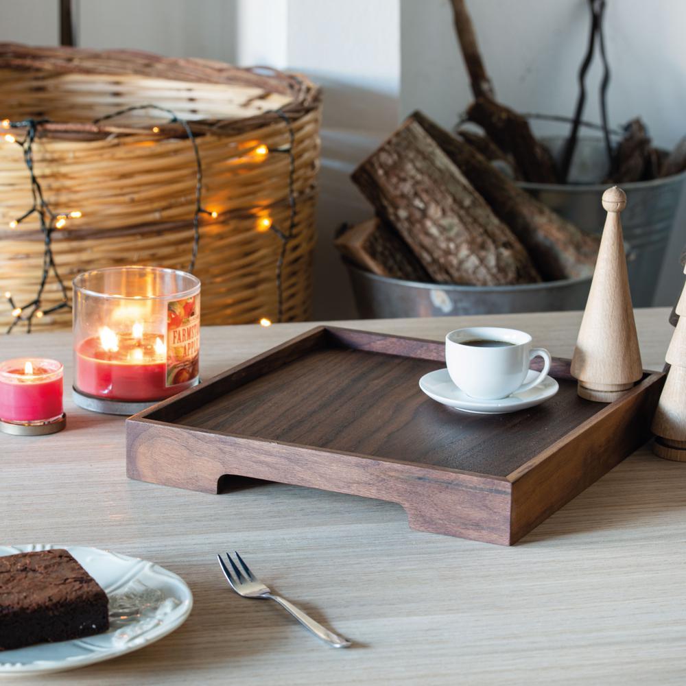 -The minimalist designed tray with hand holders allows for different uses, such as a serving tray in the kitchen or as a tray on which you can place decorative objects in the living room.
-Included in the Edge Series, this tray is made of walnut