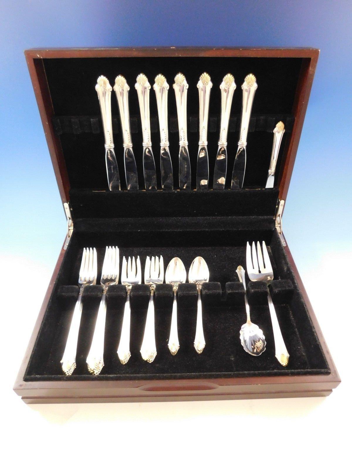 Dinner size estate edgemont gold by Gorham sterling silver flatware set - 35 pieces. This set includes:

Eight dinner size knives, 9 3/8