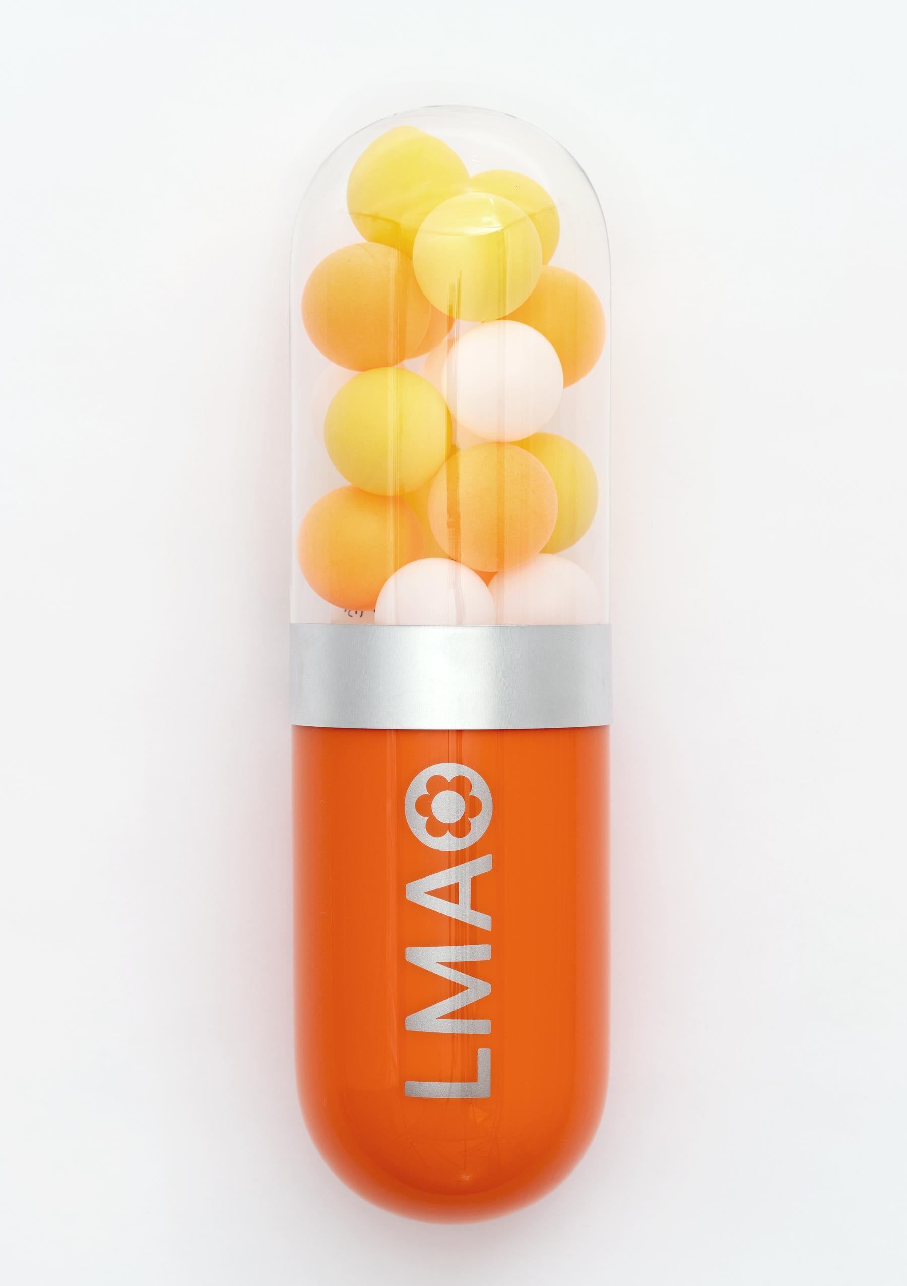 LMAO (Laughing My Ass Off) - Orange glass pill sculpture - Sculpture by Edie Nadelhaft