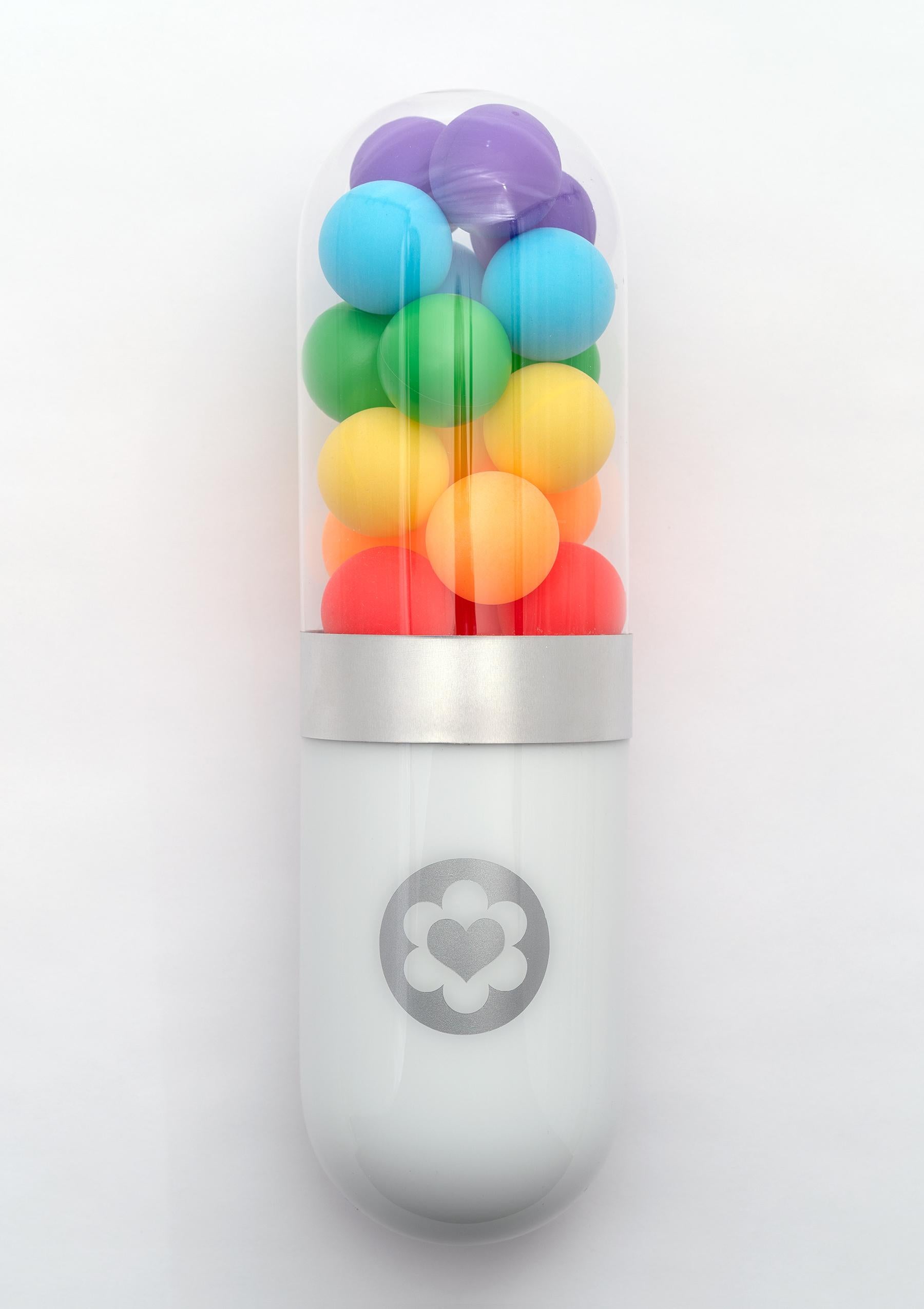 Edie Nadelhaft Still-Life Sculpture - Love Wins - Rainbow color glass pill wall sculpture