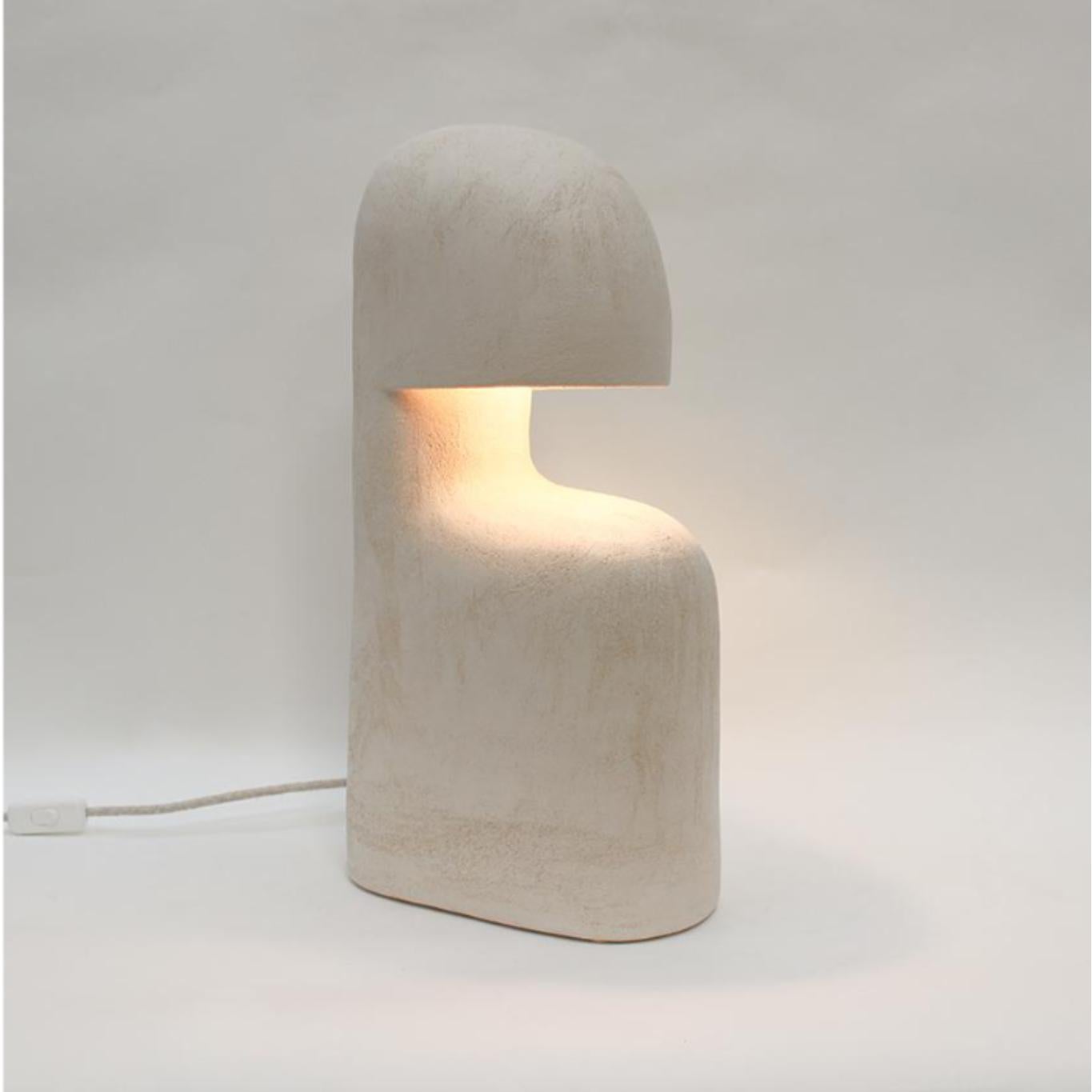 Edifice #41 stoneware lamp by Elisa Uberti
Unique Piece
Dimensions: H 50 cm
Materials: White Stoneware
This product is handmade, dimensions may vary. 

After fifteen years in fashion, Elisa Uberti decides to take the time to work with these