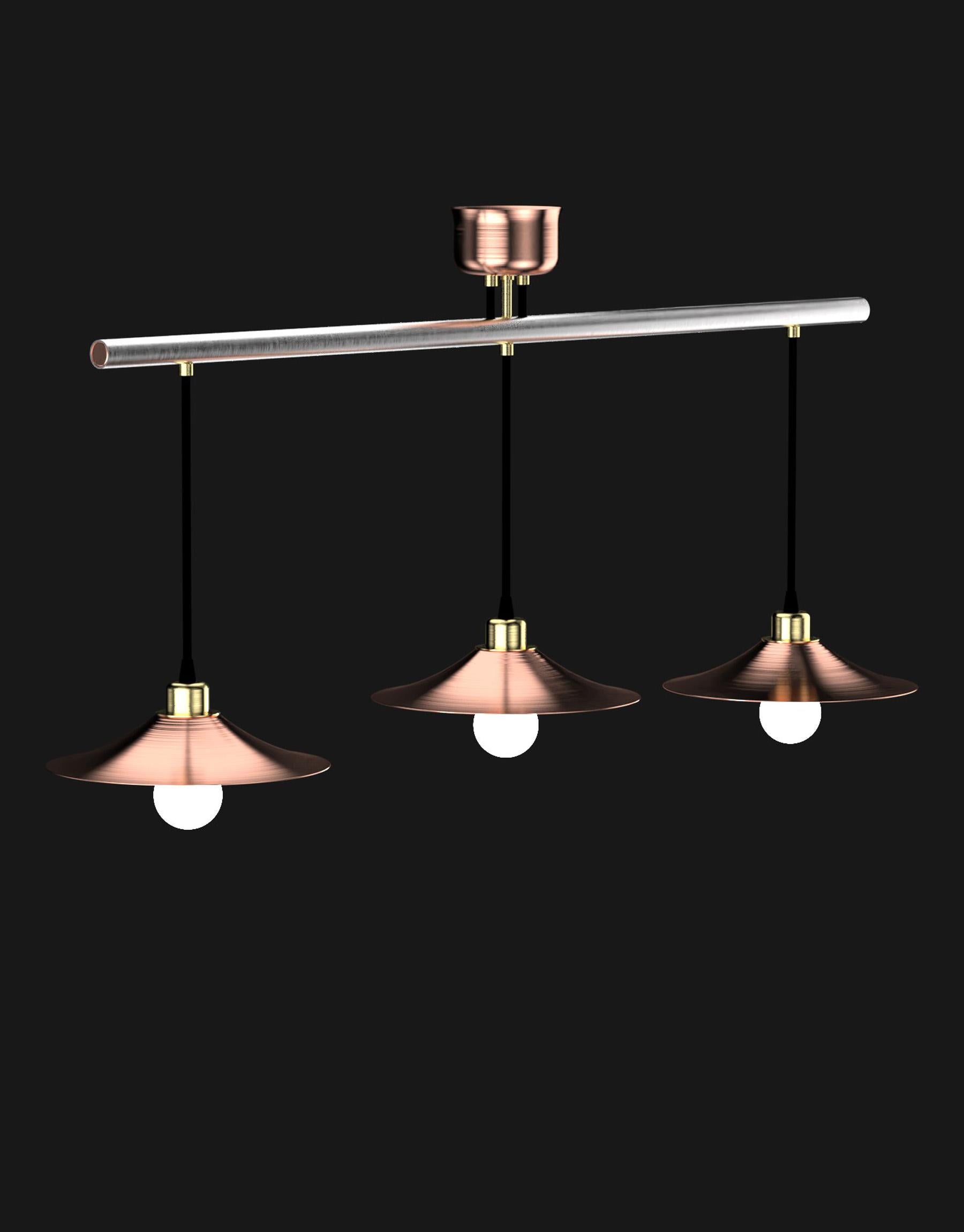 Made from genuine brass and 304L stainless steel, this luminaire is our interpretation of an industrial pendant. The elegance of the raw material is omnipresent in the stainless steel tubes and brass ceiling lights. A perfect blend of elegance and