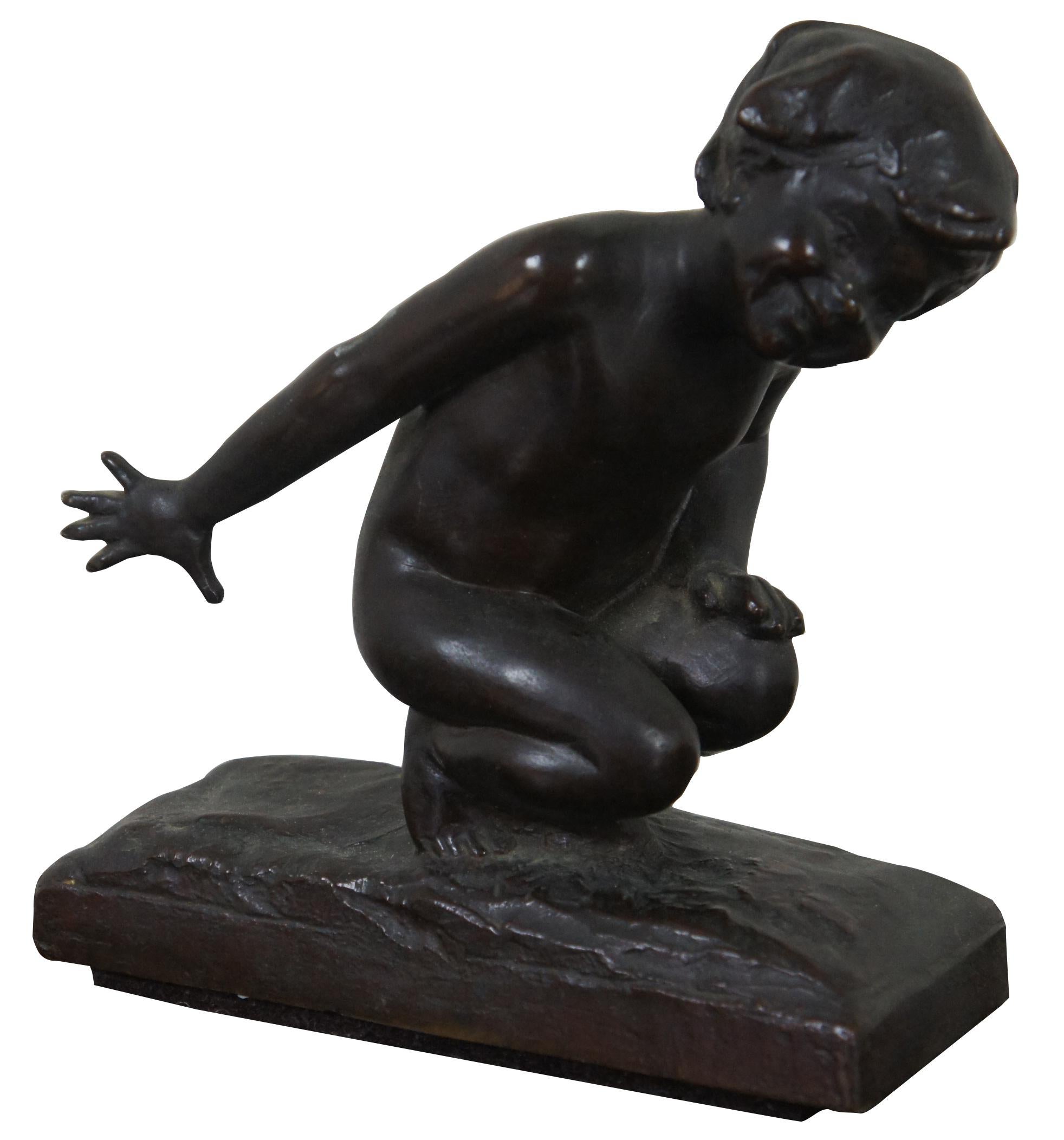 Two bronze bookends featuring two children playing by Edith Barretto Parsons, marked with copyright 1913, produced by the Gorham Co foundry. / BIO: Edith Barretto Stevens, grandmother of Serena Pelissier, was born in Halifax, Virginia, in 1878, as