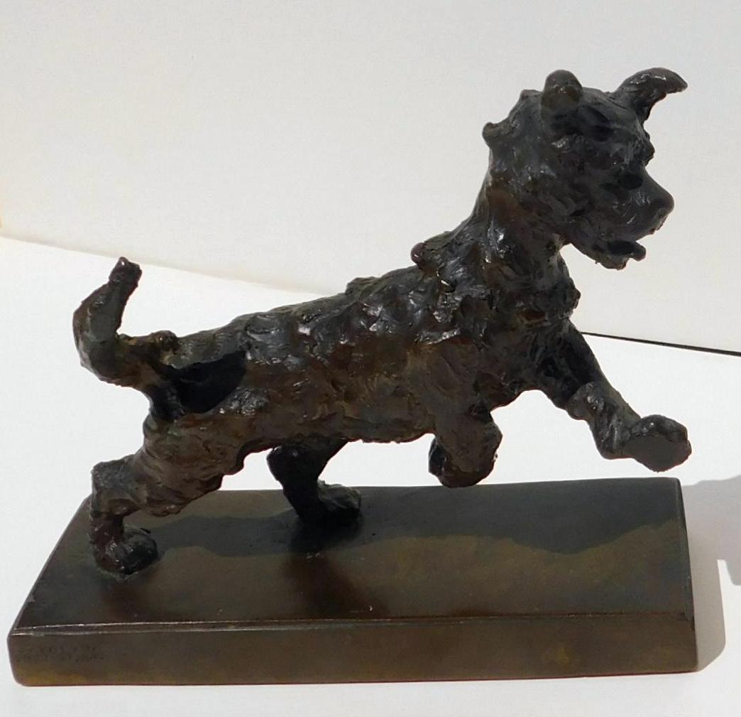 Edith Baretto Parsons (1878-1956) pair of lost-wax cast patinated bronze dog sculptures.
The seated pup is signed in the cast “E.B. Parsons” and cold stamped Gorham Co. OFFW.
It measures 5 3/4
