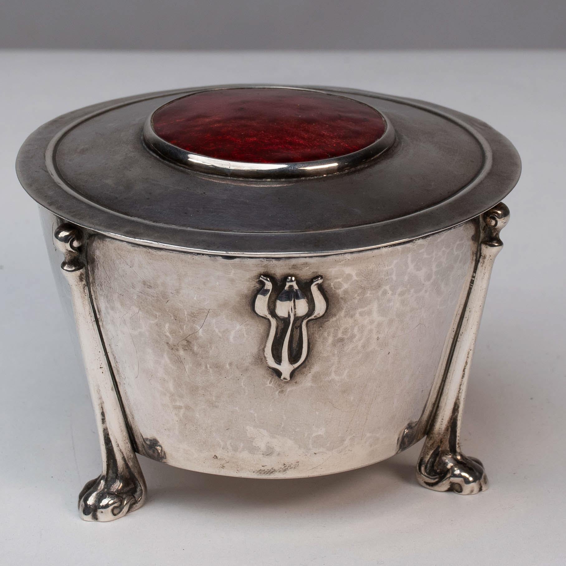 Hand-Crafted Edith Dawson. An Arts & Crafts Silver Pot with Floral Details & A Red Enamel Lid For Sale