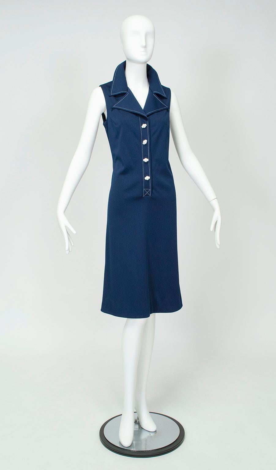 Known for her easy, swirling and practical dresses, Edith Flagg was famous for her use of polyester jersey for good reason: she was the first designer to import the fabric for fashion use in the United States. This dress’s simple trumpet cut,