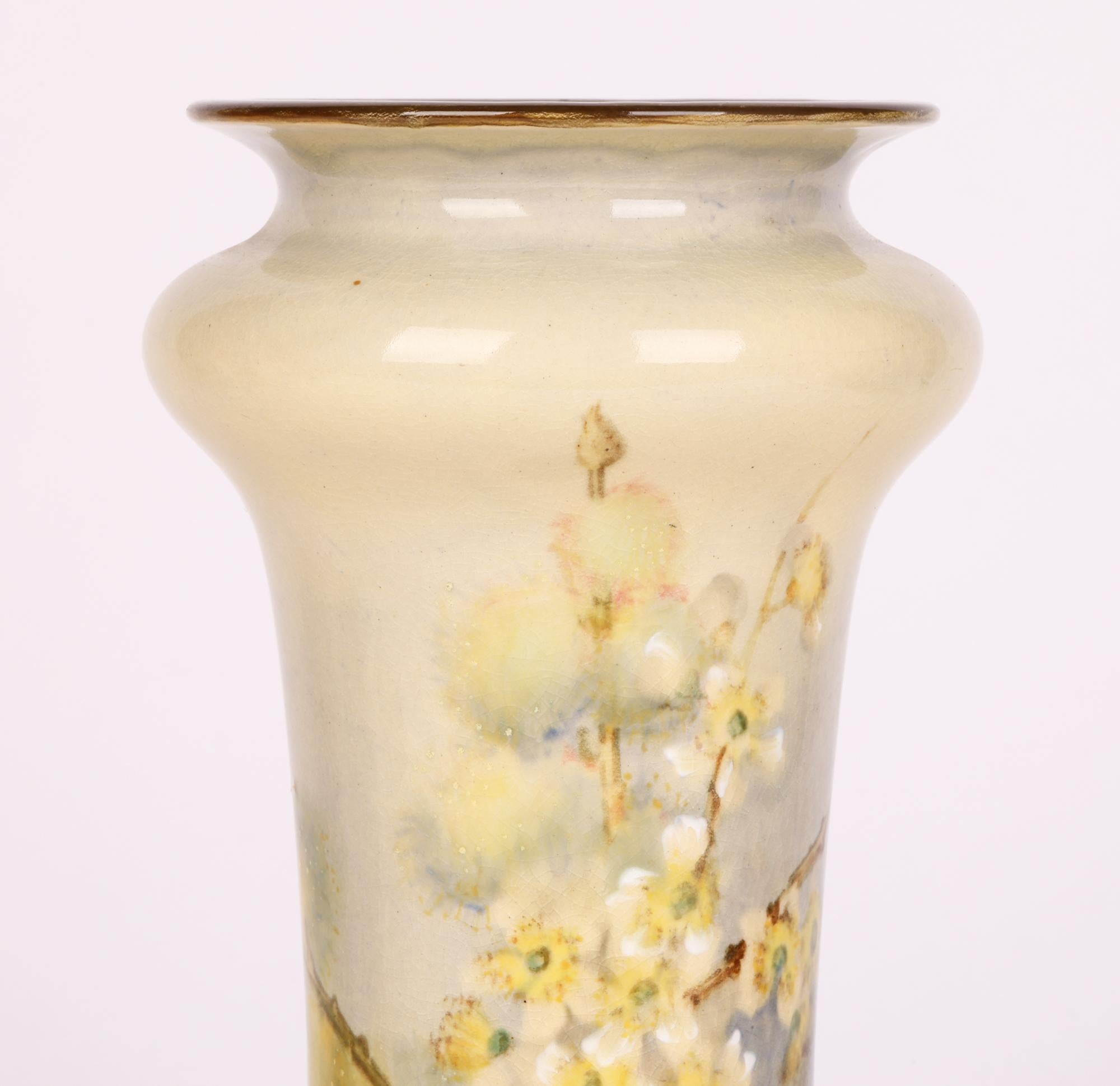 A stunning Arts & Crafts Doulton Lambeth Faience hand painted vase with yellow flowering stems by renowned artist Edith Jane Gillman and dating from around 1896. Edith Gillman joined Doulton Lambeth dated 1905 and was a talented flower painter who