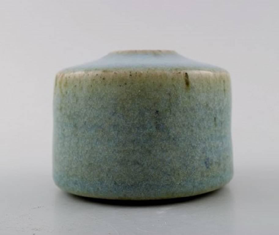Edith Sonne Bruun for B&G / Bing & Grondahl, small ceramic vase, beautiful blue-green glaze.
Stamped.
In perfect condition.
Measures 9.5 x 8 cm.