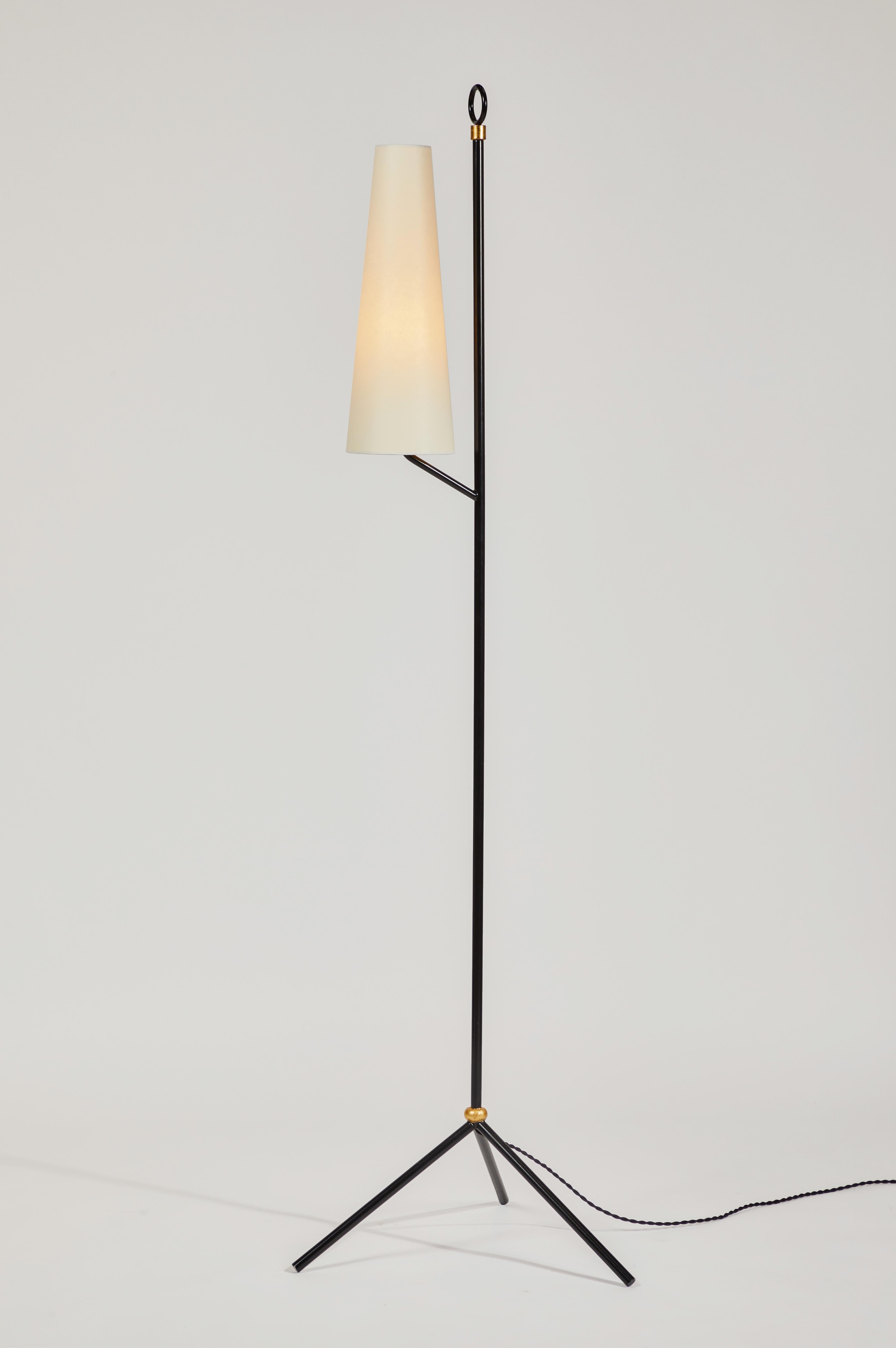 Sculptural custom tripod floor lamp. Handcrafted in Los Angeles with scrupulous attention to detail and materials. Executed in high quality lacquered metal and patinated gold leaf with rigid parchment shades, this ultra refined design adds a