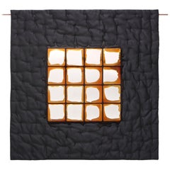 Edizioni del Pesce Meritalia Mirror 4: espejo de pared de Gaetano Pesce, negro y naranja