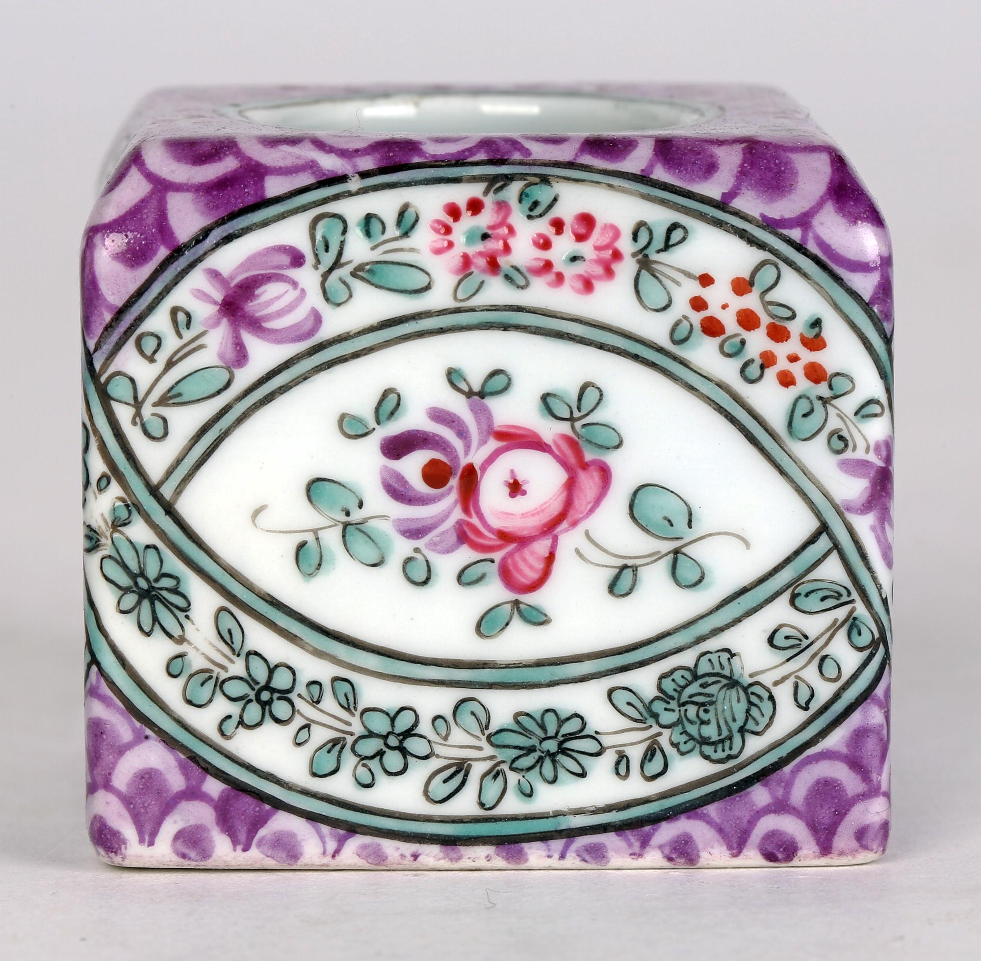 A very finely made antique French Paris porcelain inkwell made in the Chinese style by Edmé Samson (French, 1810-1891) and dating from the latter 19th century. The inkwell is of small cube form with a rounded opening to the top and would probably