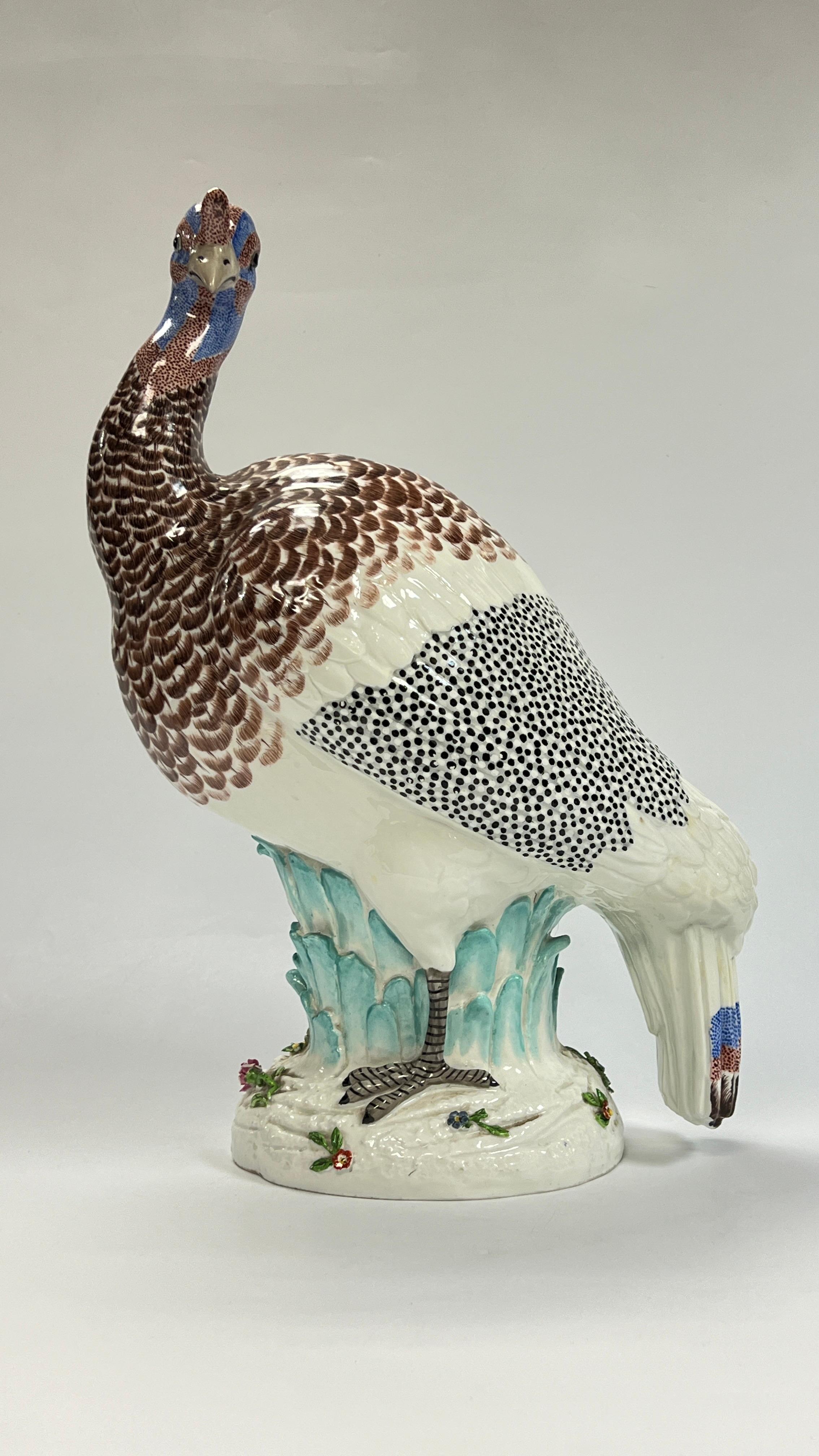 Wonderful and very large (18 inch tall) glazed porcelain figure of a seated guinea fowl, attributed to the master porcelain copyist, Edme Samson (1810-1898), with blue crossed swords mark.