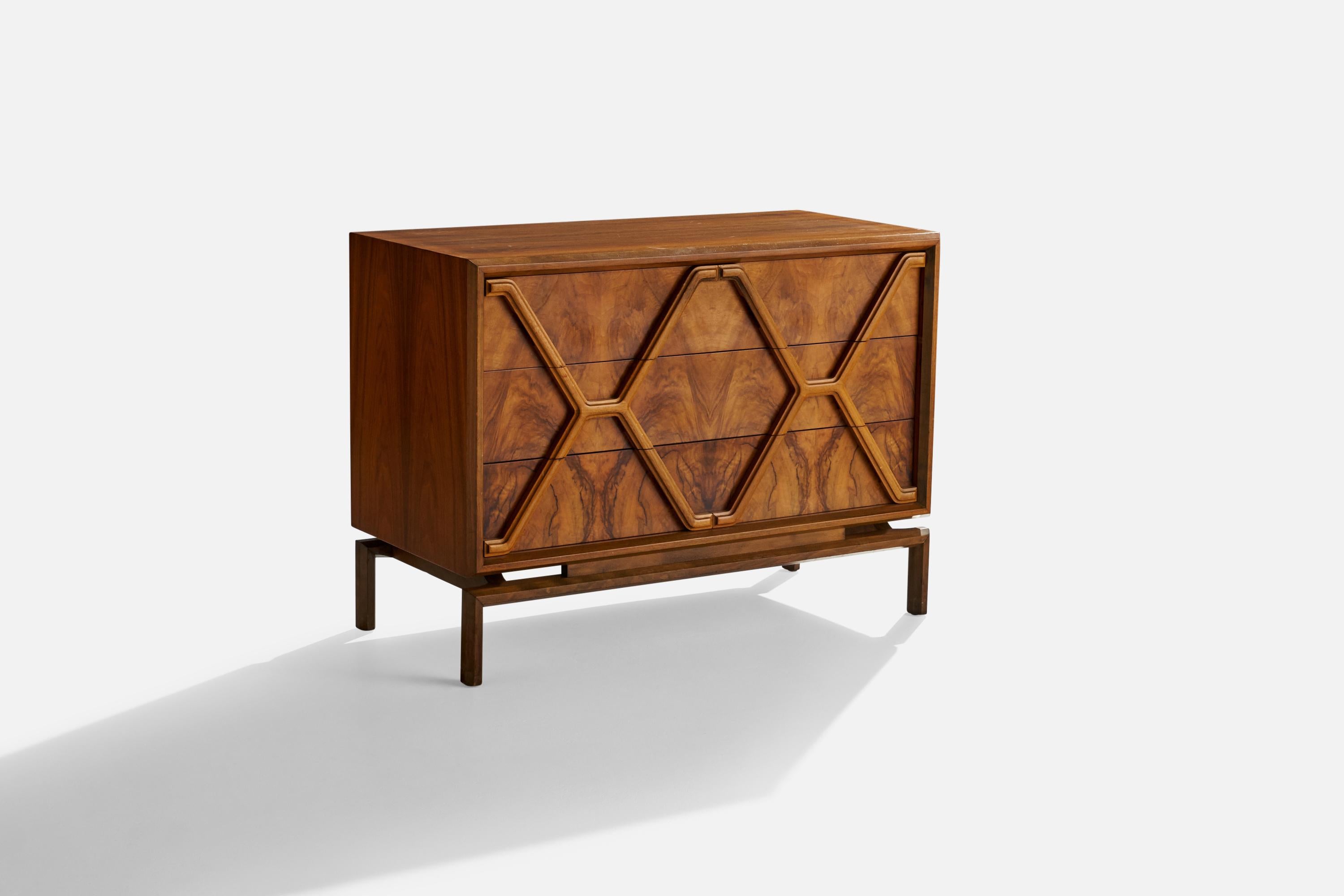 A rosewood chest of drawers or commode designed and produced by American designer Edmond J. Spence and produced in Sweden, c. 1950s.