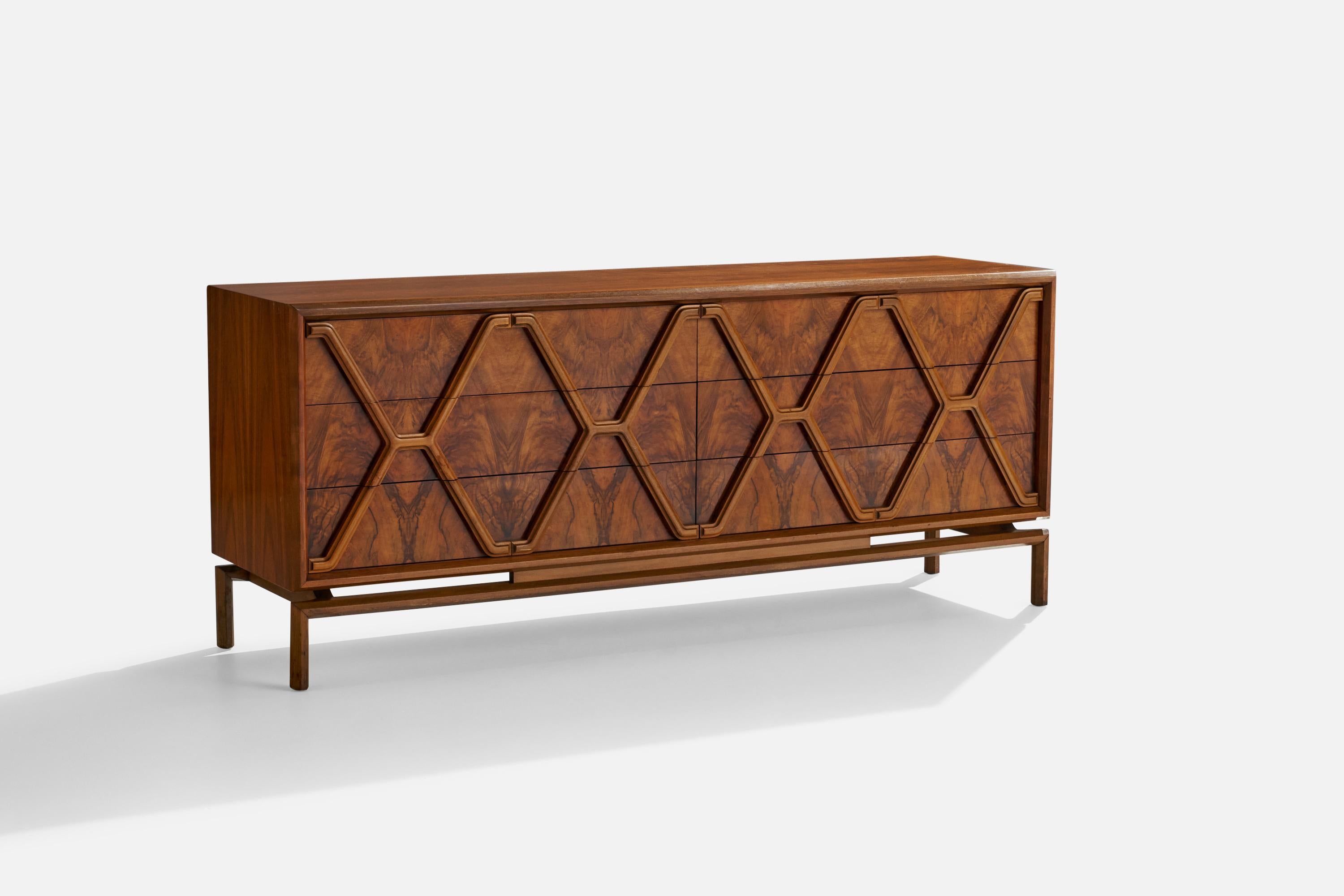 A rosewood dresser designed and produced by American designer Edmond J. Spence and produced in Sweden, c. 1950s.
