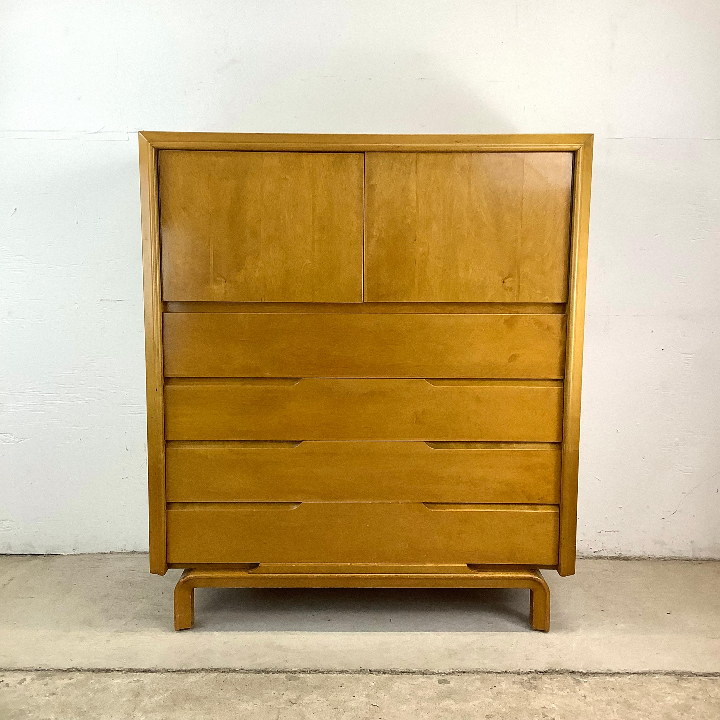 Constructed with high-quality birch finish, this piece features a rich, warm tone that highlights the natural grain of the wood. Its minimalist design, with clean lines and an airy silhouette, captures the essence of mid-century modernism while