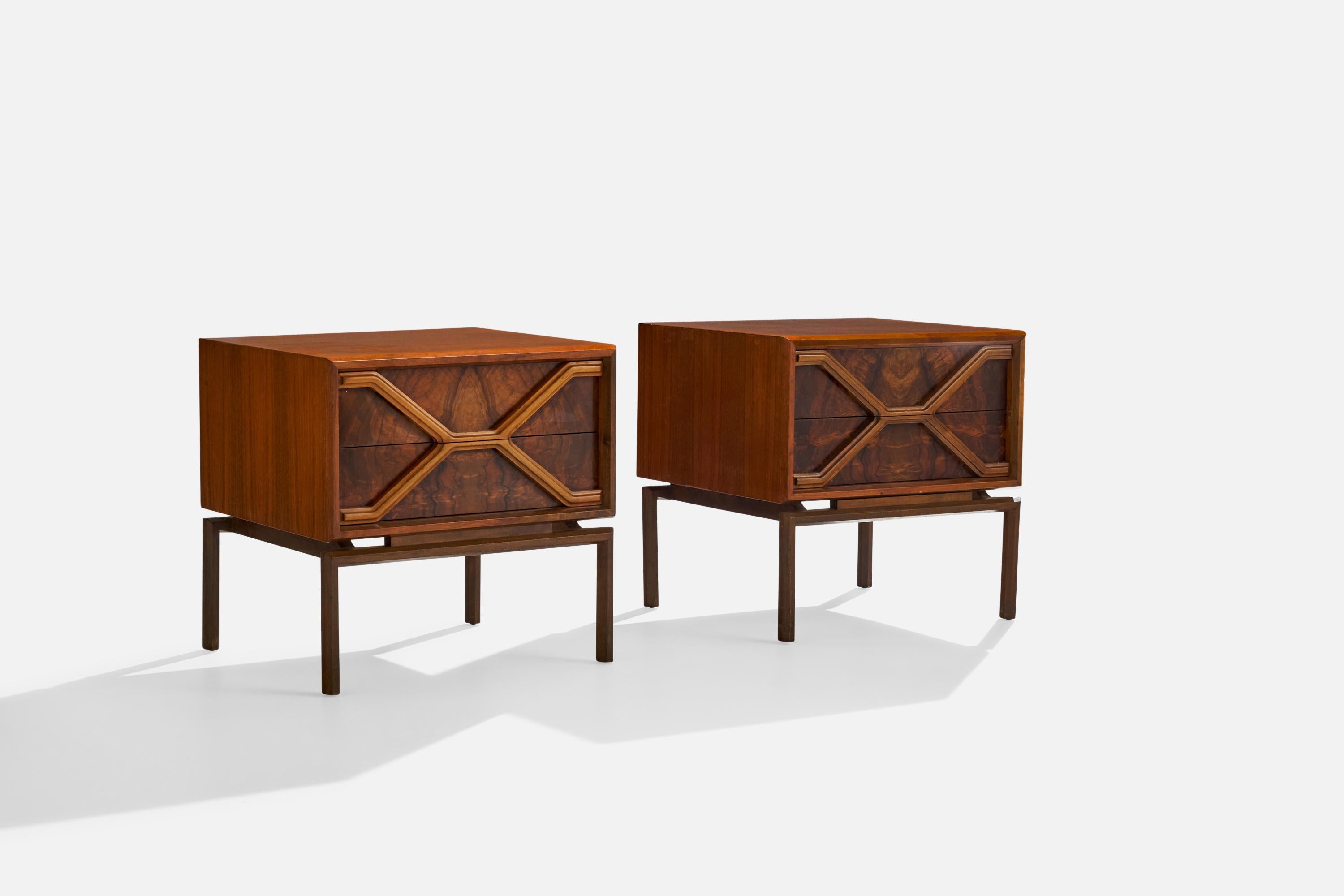A pair of rosewood nightstands or bedside cabinets designed and produced by American designer Edmond J. Spence and produced in Sweden, c. 1950s.