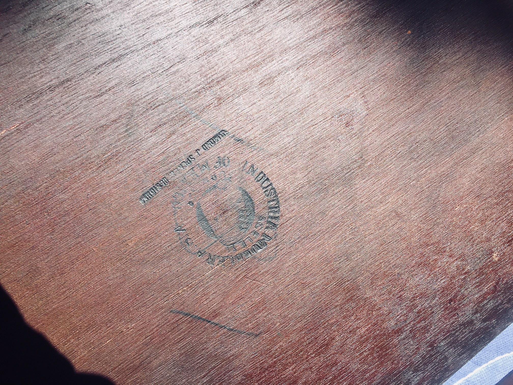 An extraordinary extendable mahogany dining table by Edmund Spence manufactured by Industria Mueblera in Mexico in the 1950s. 
The cast metalwork is gold leafed.
The table has Edmund Spence's Industria Mueblera stamp and additional identification