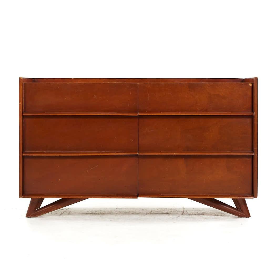 Edmond Spence Mid Century Birch Lowboy Dresser

This lowboy measures: 54.25 wide x 20.25 deep x 30.5 inches high

All pieces of furniture can be had in what we call restored vintage condition. That means the piece is restored upon purchase so it’s