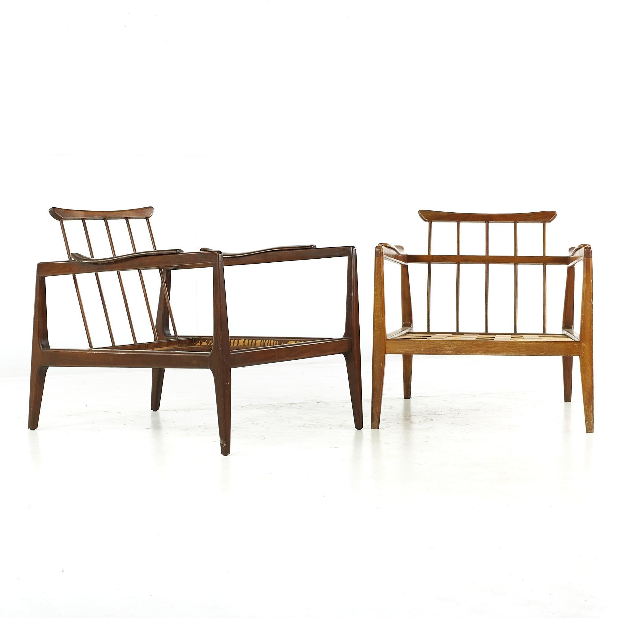 Edmond Spence mid-century lounge chairs - pair.

Each chair measures: 27 wide x 33.5 deep x 28 high, with a seat height of 13 (without cushion) and arm height/chair clearance 23 inches

All pieces of furniture can be had in what we call restored