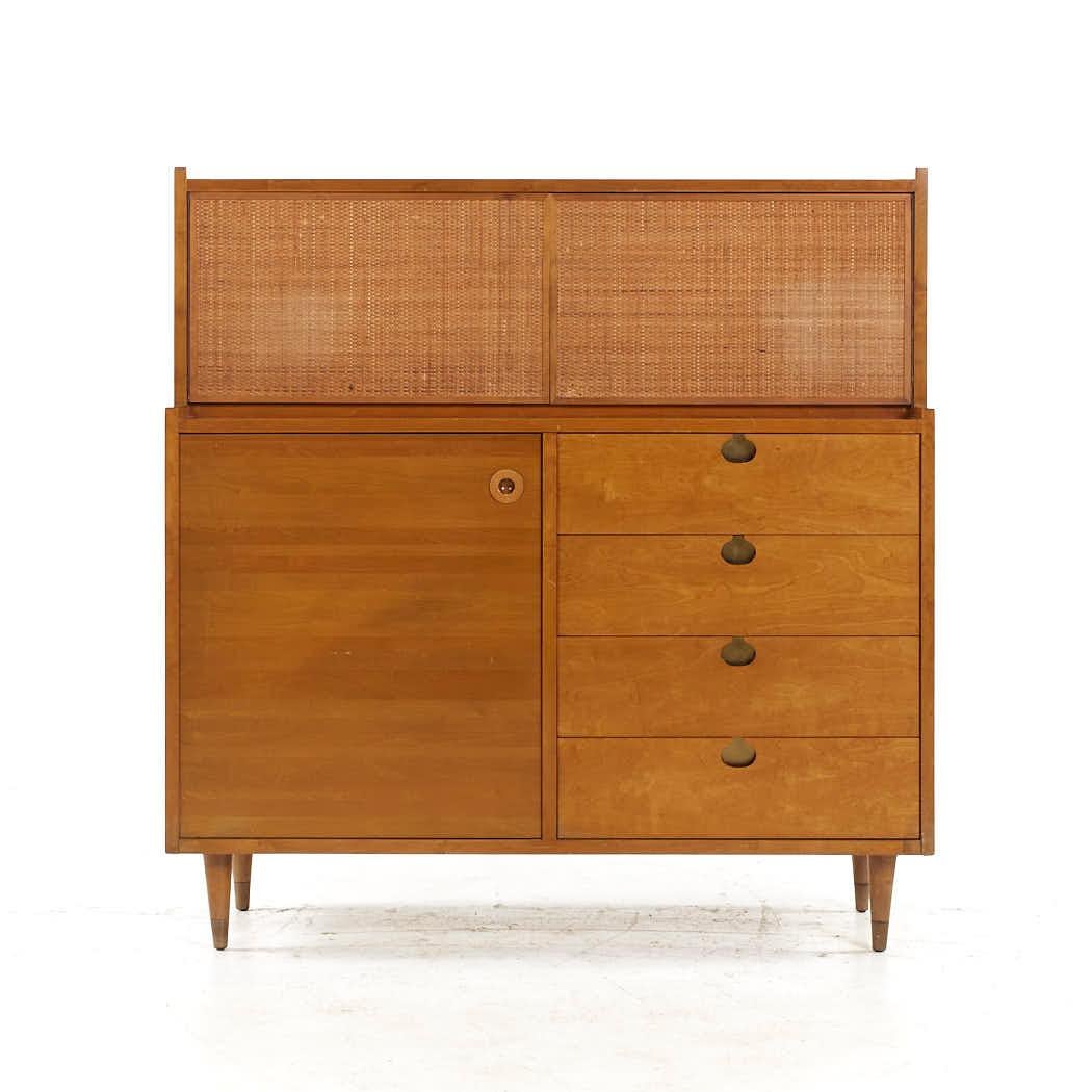 Edmond Spence Mid Century Maple Highboy Dresser

This highboy measures: 44.25 wide x 18.25 deep x 45.75 inches high

All pieces of furniture can be had in what we call restored vintage condition. That means the piece is restored upon purchase so