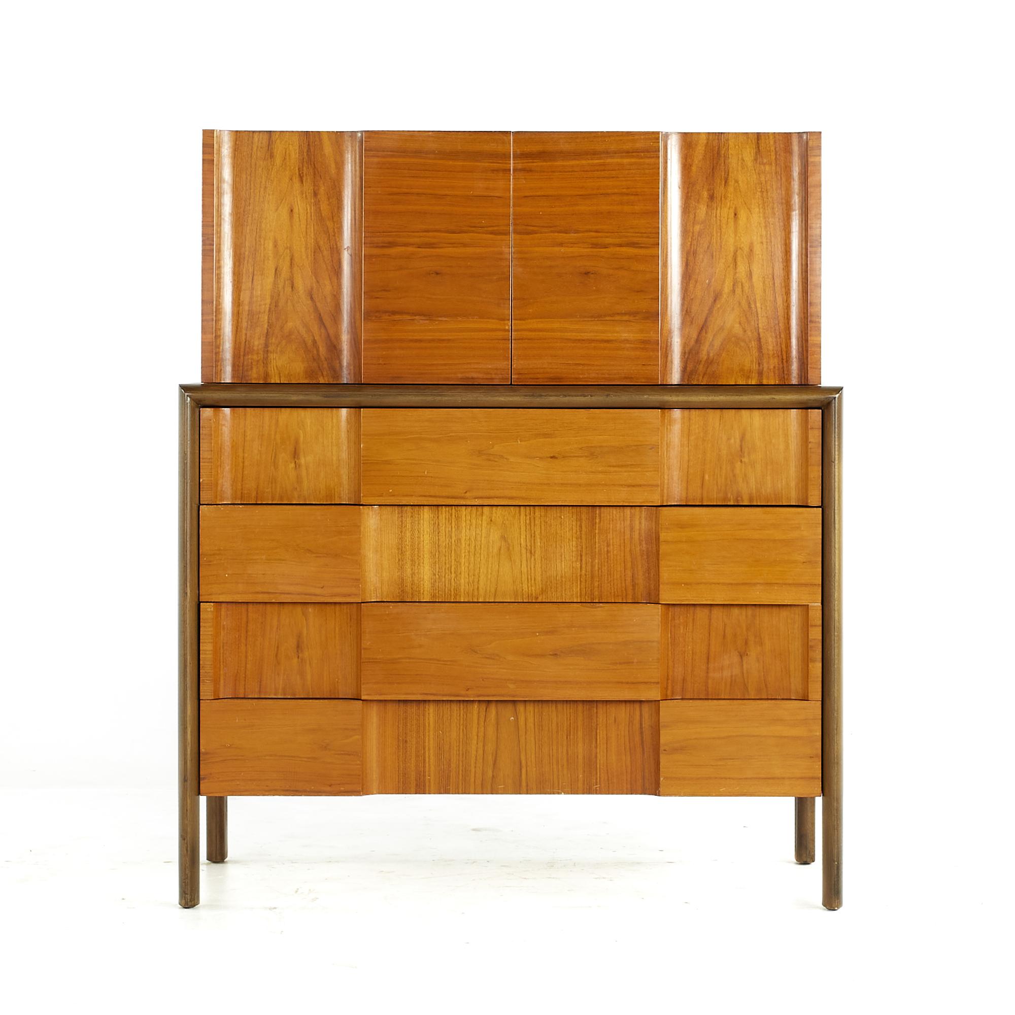 Edmond Spence midcentury Swedish Walnut Highboy Dresser

This highboy measures: 41.25 wide x 20 deep x 48.5 inches high

All pieces of furniture can be had in what we call restored vintage condition. That means the piece is restored upon