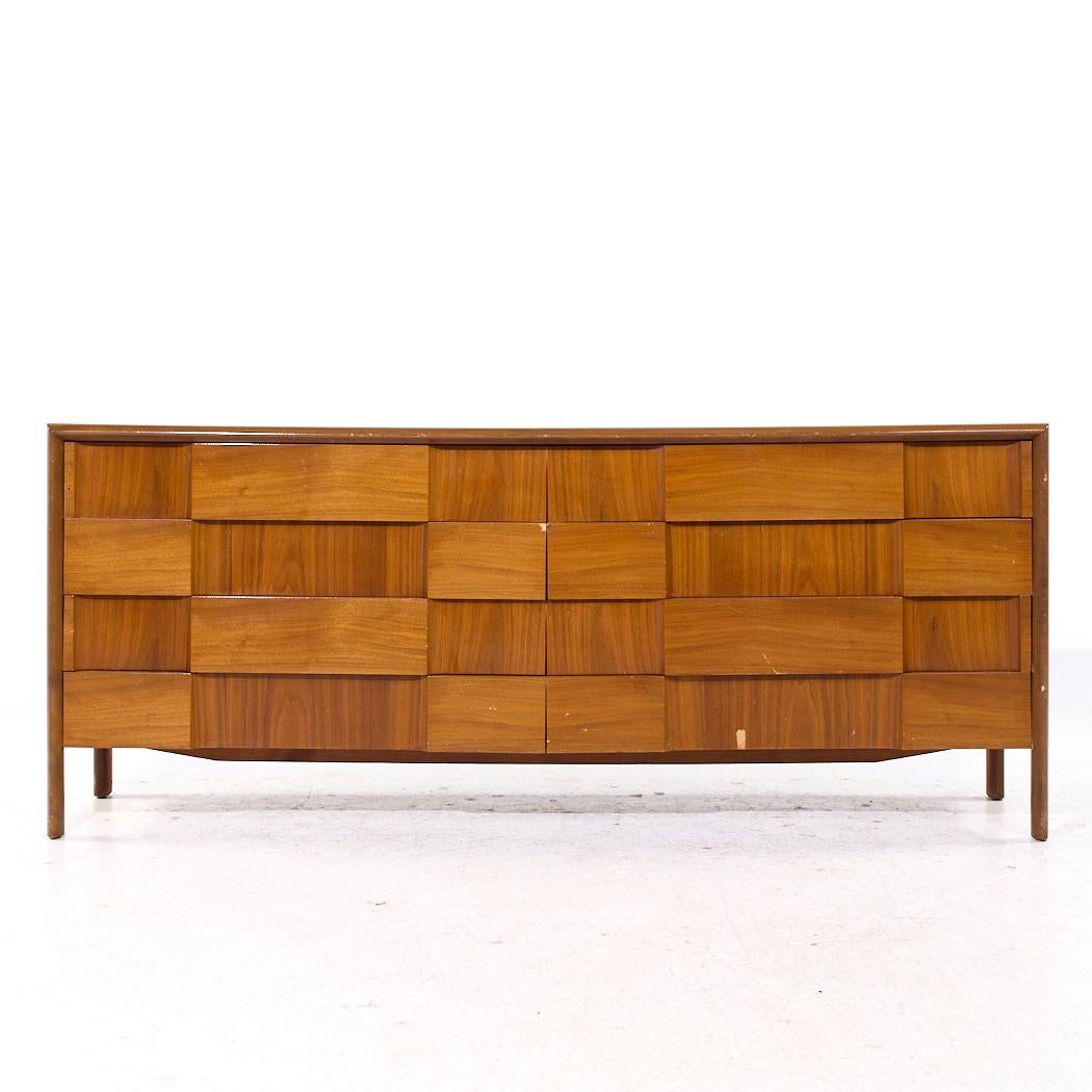 Edmond Spence Mid Century Swedish Walnut Lowboy Dresser

This lowboy measures: 78.25 wide x 19.75 deep x 32.5 inches high

All pieces of furniture can be had in what we call restored vintage condition. That means the piece is restored upon purchase