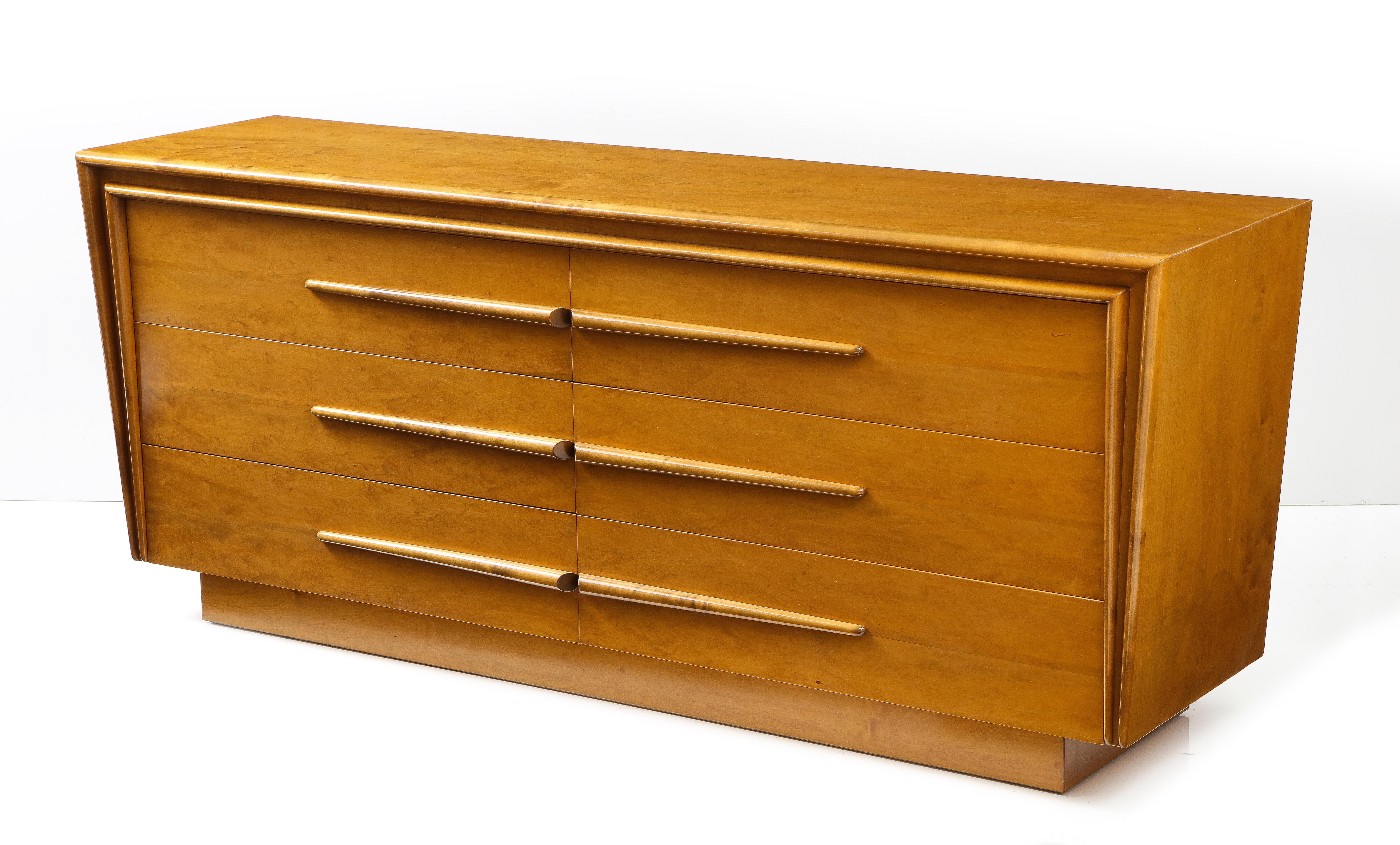 Scandinavian Modern Maple dresser designed by Edmond Spence. Dresser has 6 ample drawers and case features Mid Century Styling. Restored , placement ready. Stamped made in Sweden on back.