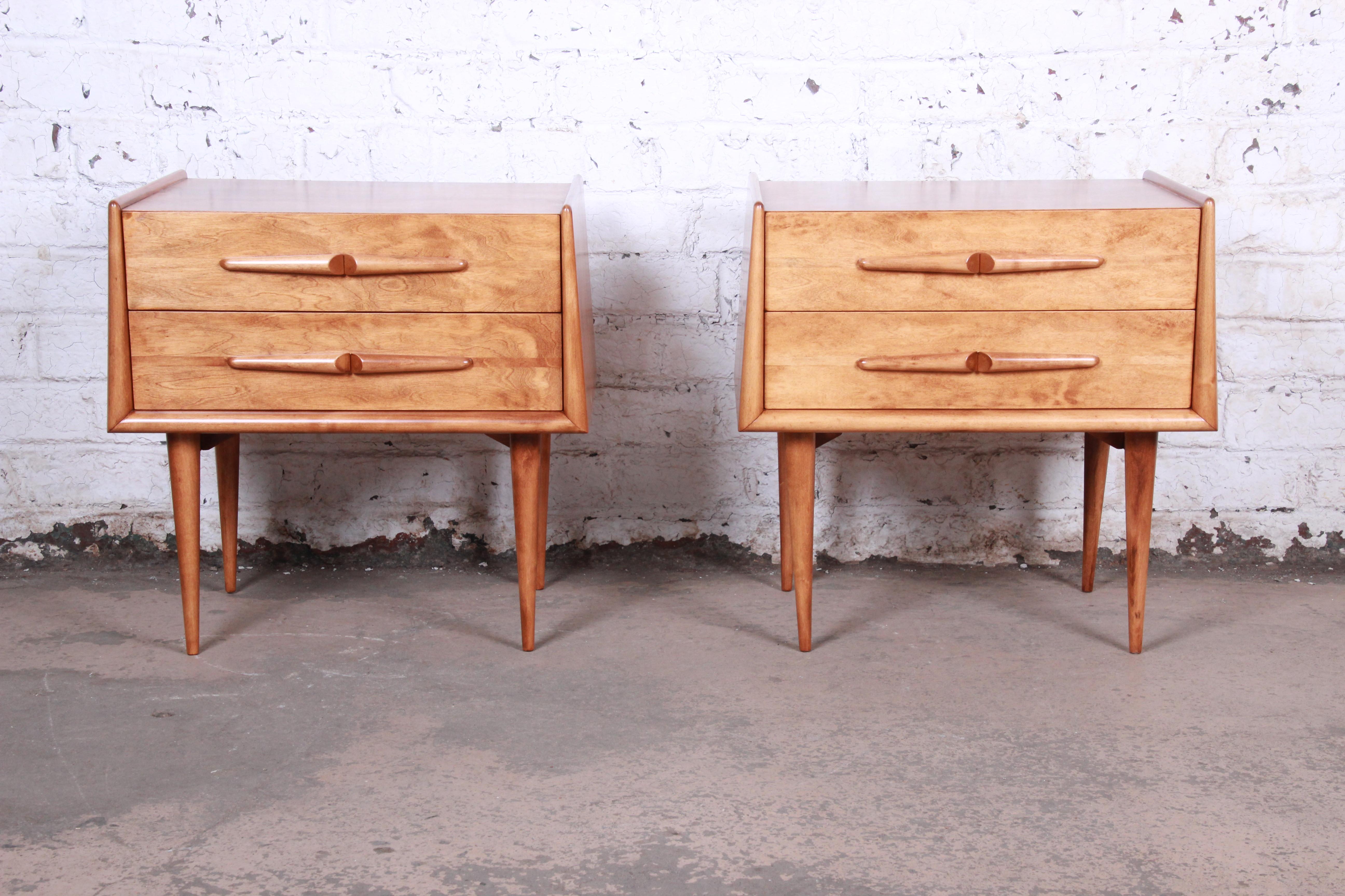 An exceptional pair of midcentury Swedish Modern birch nightstands

Designed by Edmond Spence

Sweden, 1950s

Measures: 24.38